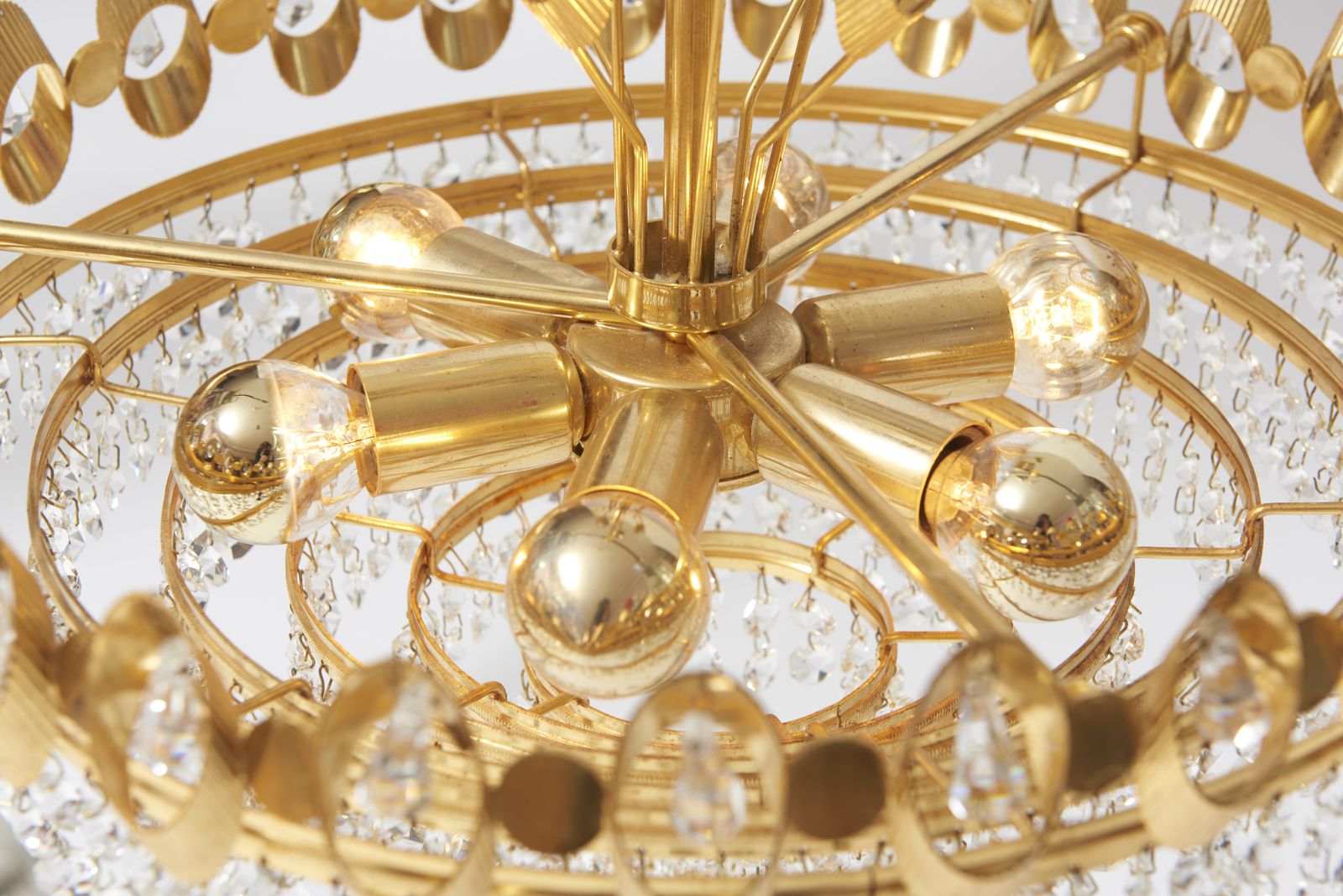 photo furniture Elegant Chandelier With Crystals On Brass Structure Designed By Palme & Walter For Palwa, Germany, 1960s.