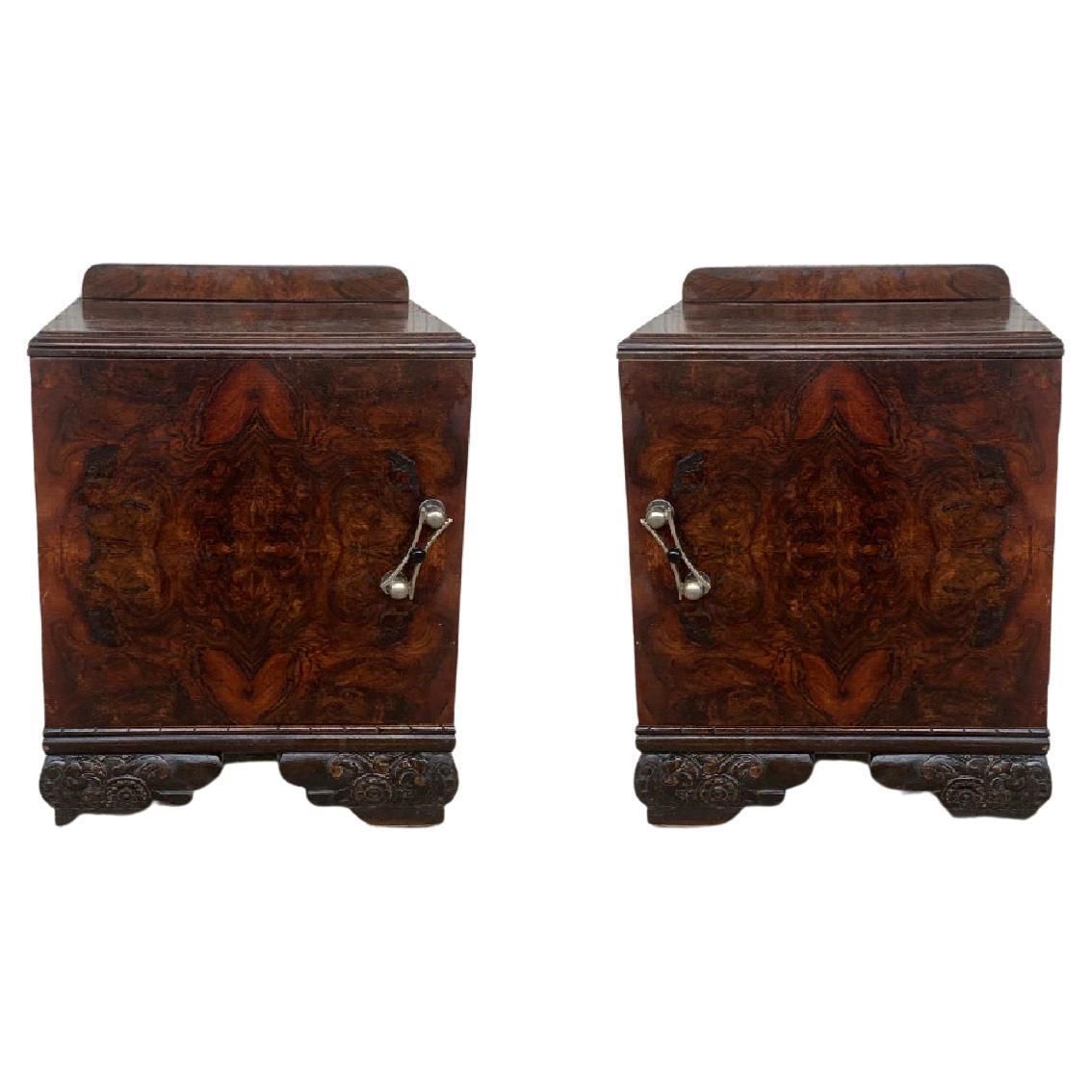 Paire de cabinets de chevet Art déco, piétement ébénisé sculpté
