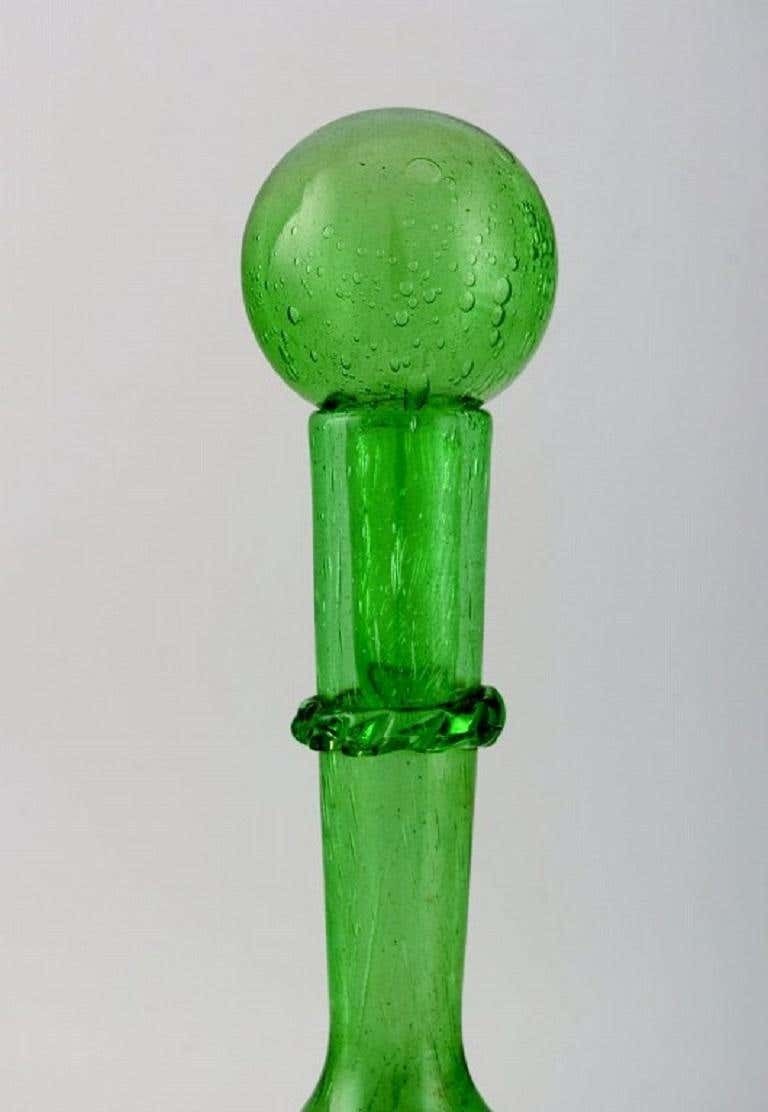 Biot, France, Two Wine Decanters And Four Glasses In Green Mouth Blown Art Glass photo for sale