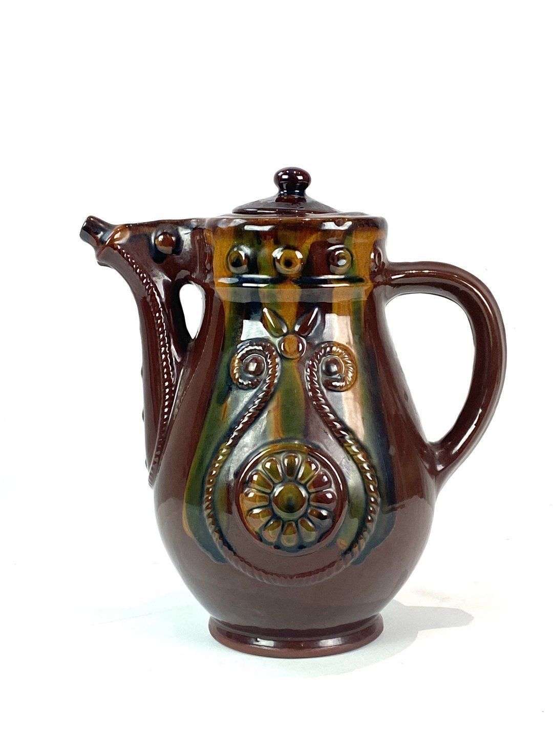 Ceramic Jug With Brown Glaze And Decorated With Pattern In Art Nouveau Style From Around The 1940s. photo furniture