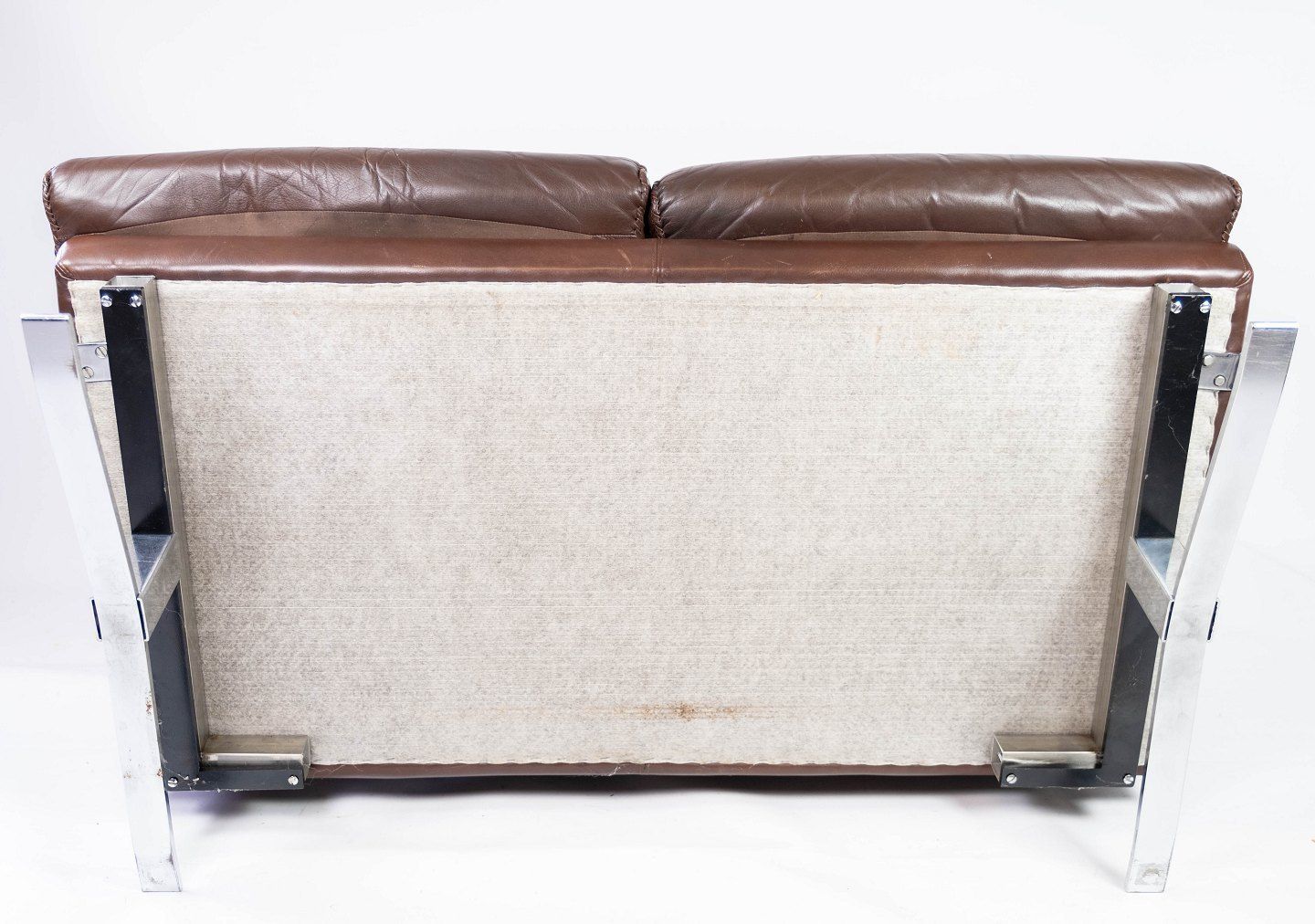 photo furniture Two Seater Sofa In Brown Patinated Leather And Metal Frame, Designed By Arne Norell From The 1970s.