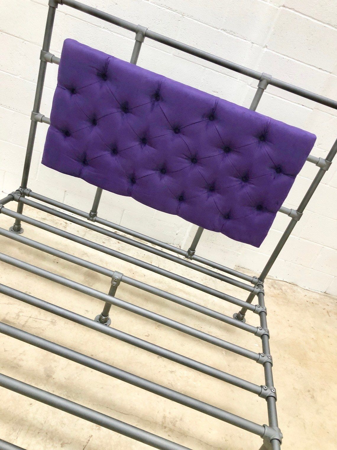 Relugas Industrial Steel Pipe Kingsize Bed Frame With Designers Guild Purple Faux Suede Deep Buttoned Padded And Upholstered Headboard photo vintage
