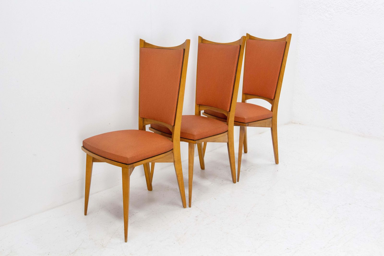 photo furniture Six Dining Chairs Beech And Red Moleskine Midcentury French, Circa 1950