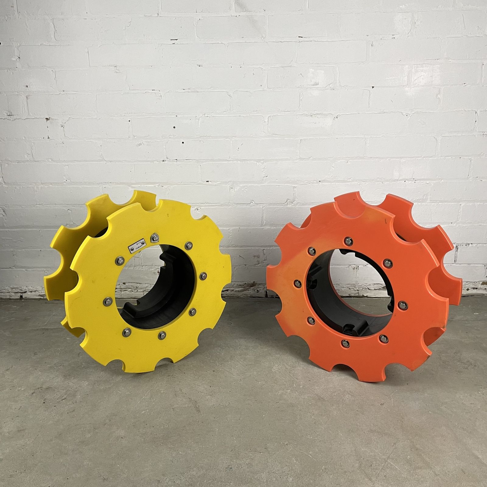 Two Reclaimed Industrial Plastic Machine Cogs photo furniture