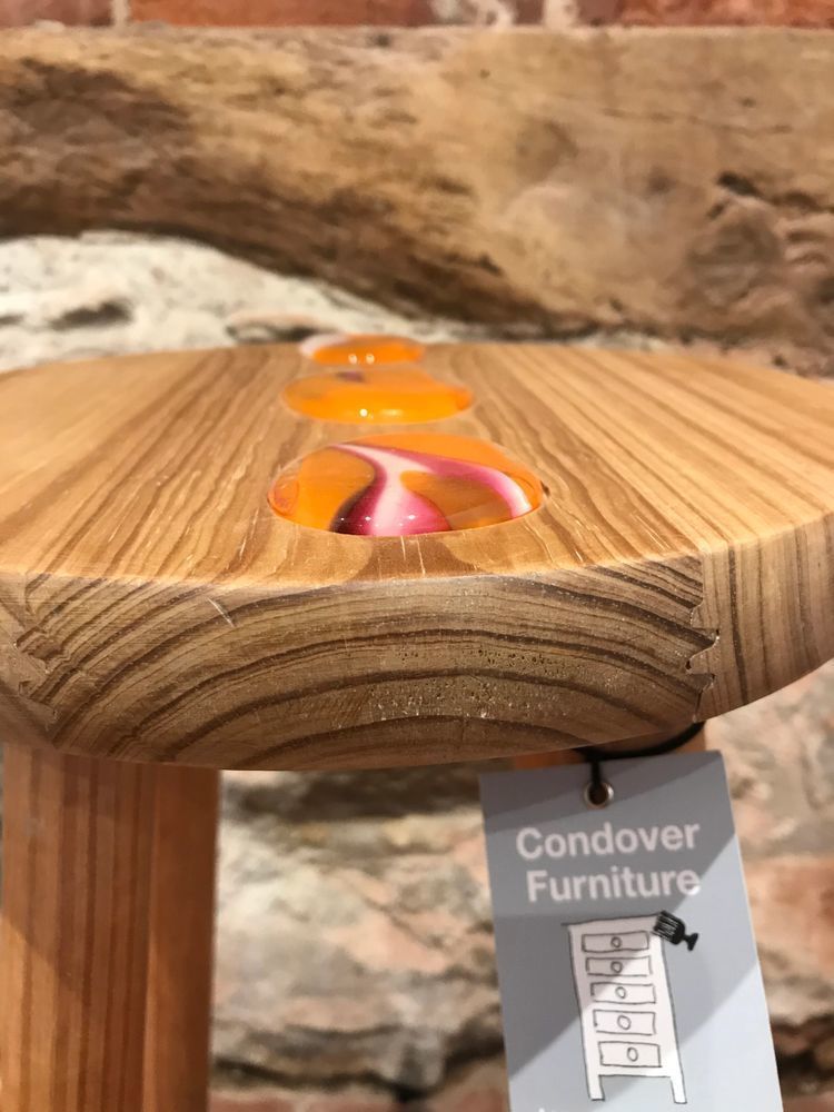 Stool  Accented With 3 Orange Glass 'Pebbles' photo for sale