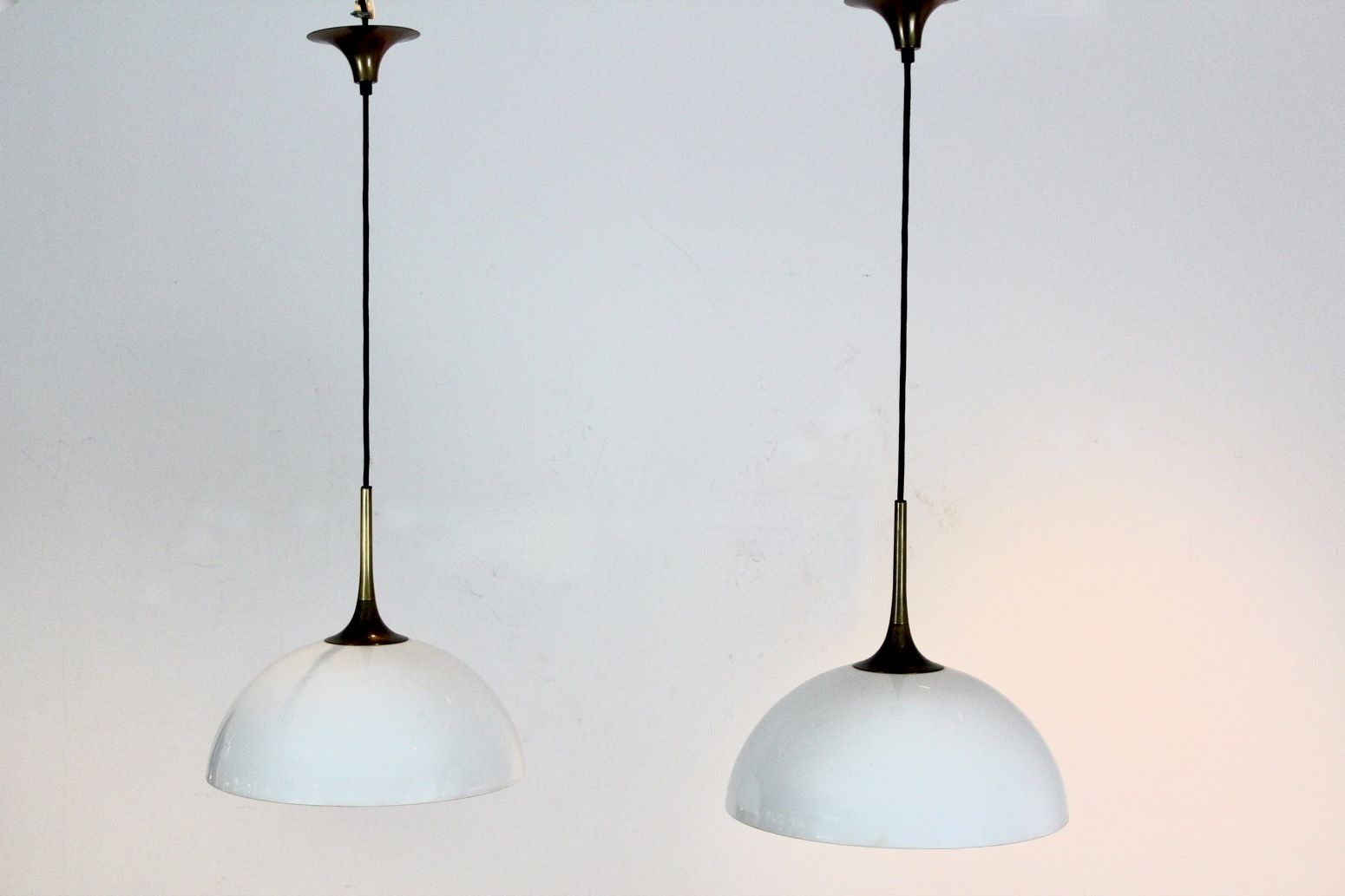 Pair Of Brass And White Opal Glass Pendant Lights By Florian Schulz photo for sale