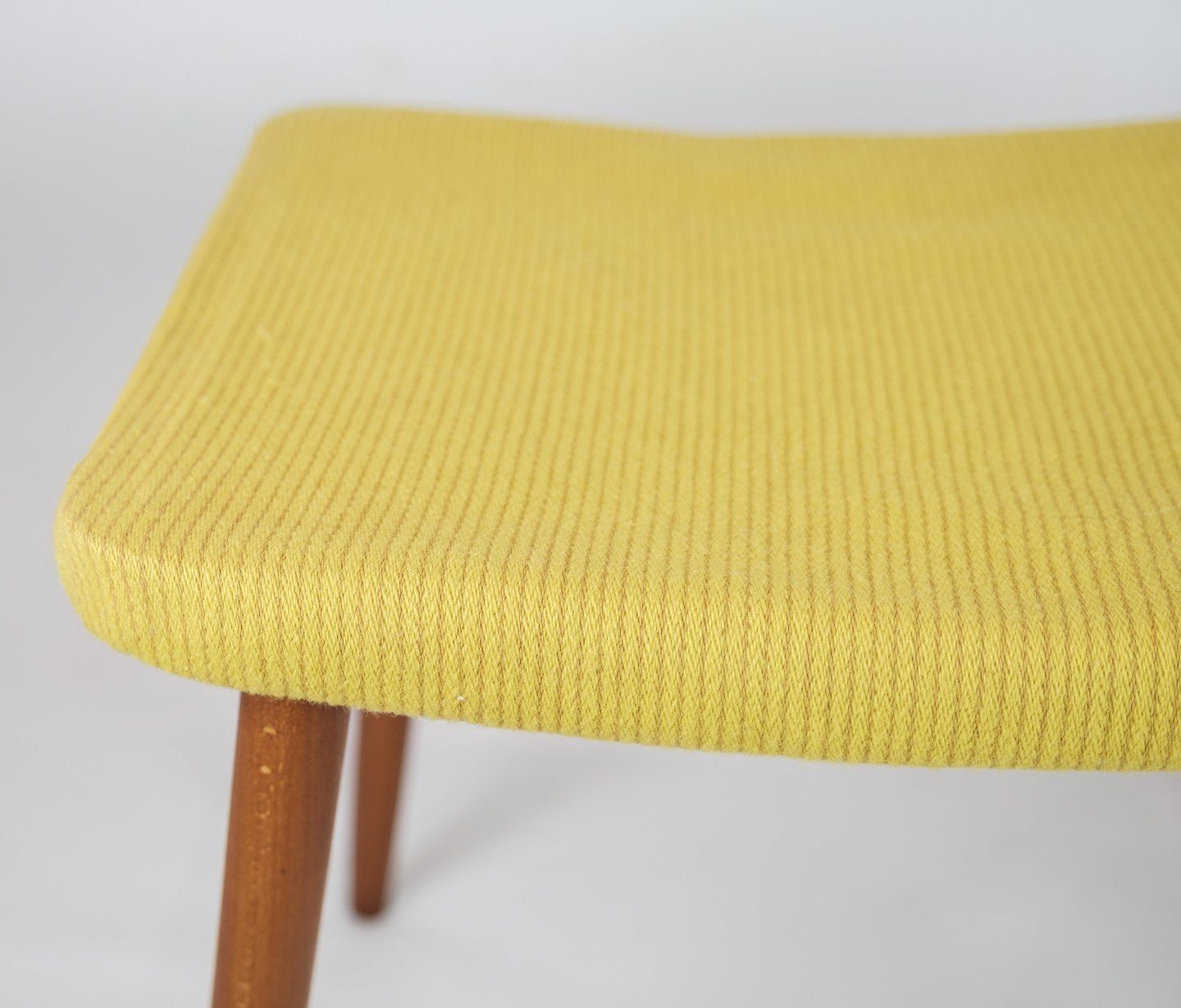 Vintage Stool With Yellow Fabric With Teak Legs In Danish Design From Around The 1960s photo for sale