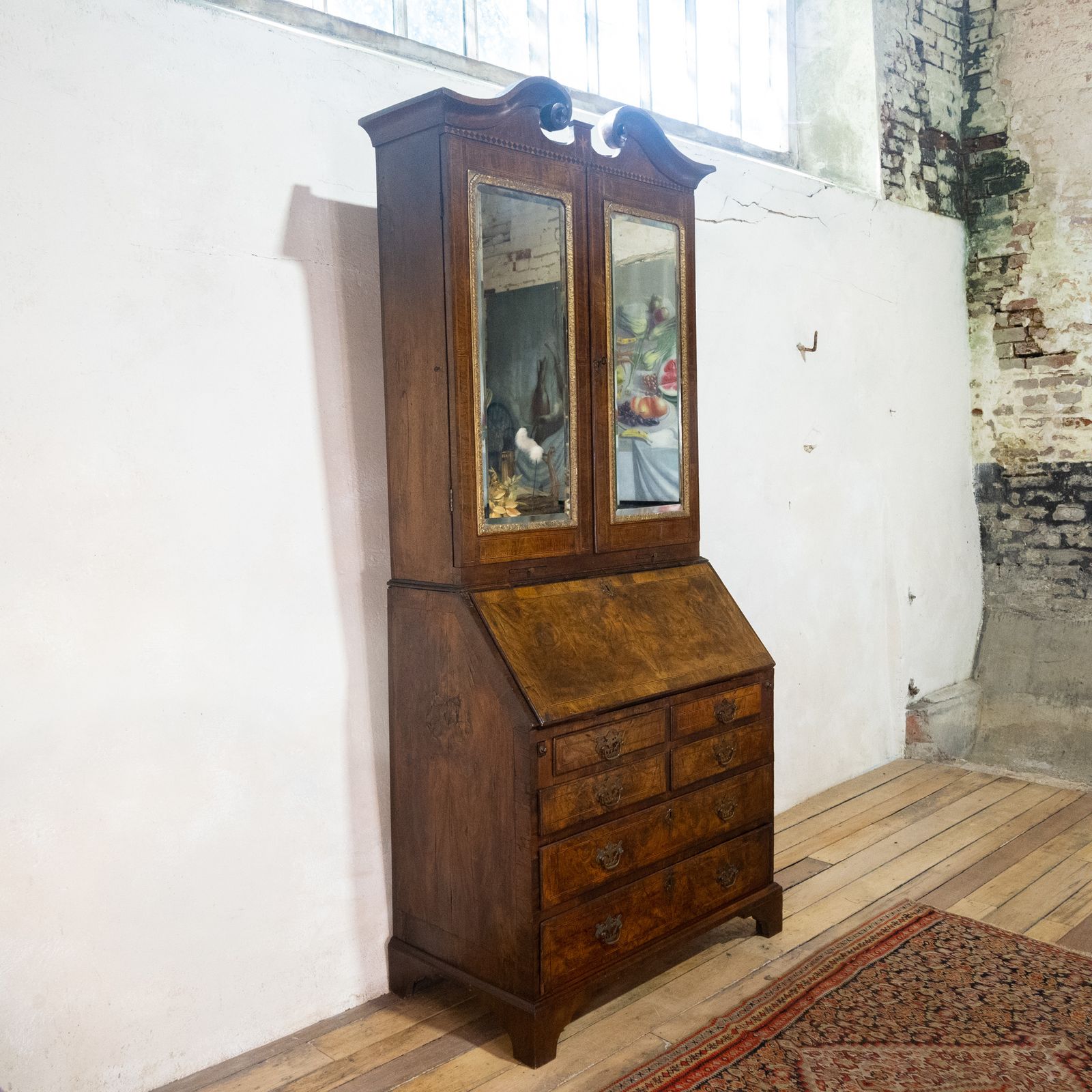 An 18th Century George I Walnut & Feather Banded Fall Front Bureau Bookcase