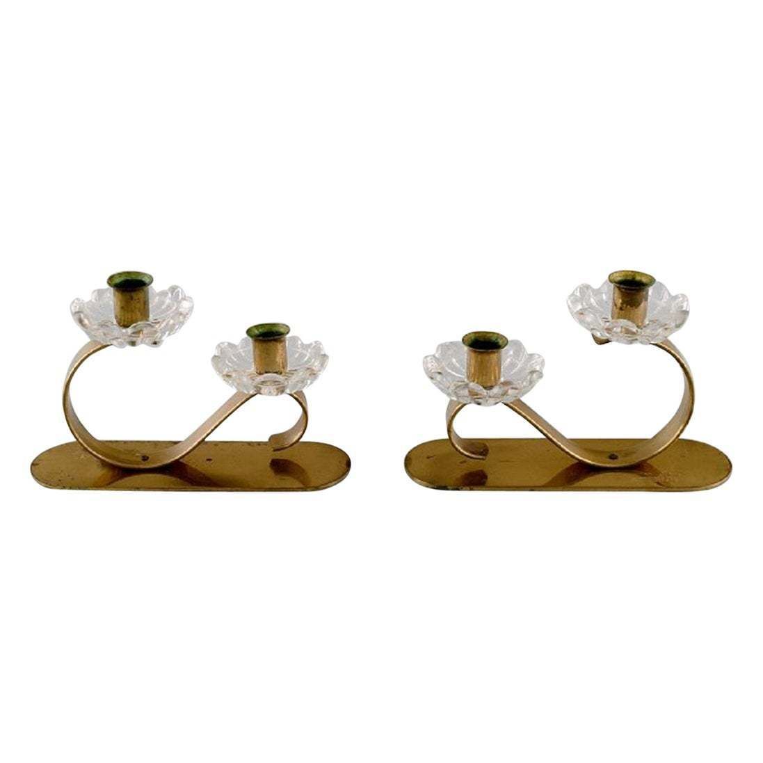 Gunnar Ander For Ystad Metall Two Candlesticks In Brass And Clear Art Glass