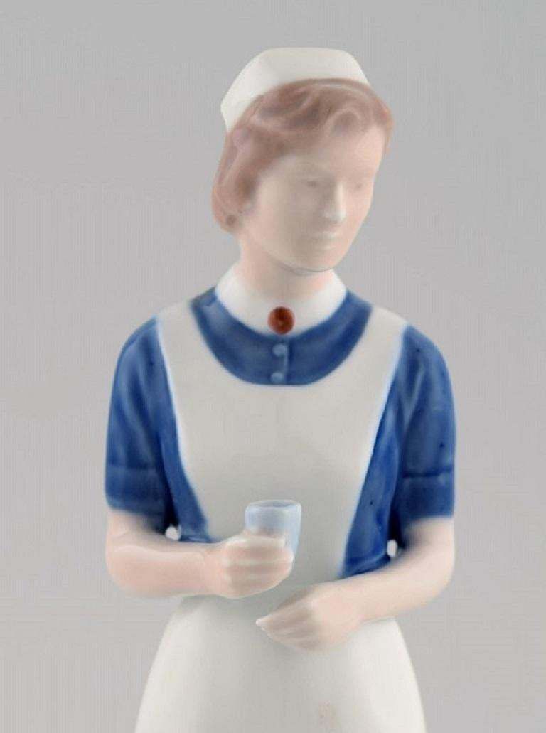 Royal Copenhagen Porcelain Figurine, Nurse, Dated 1969 1974 photo furniture