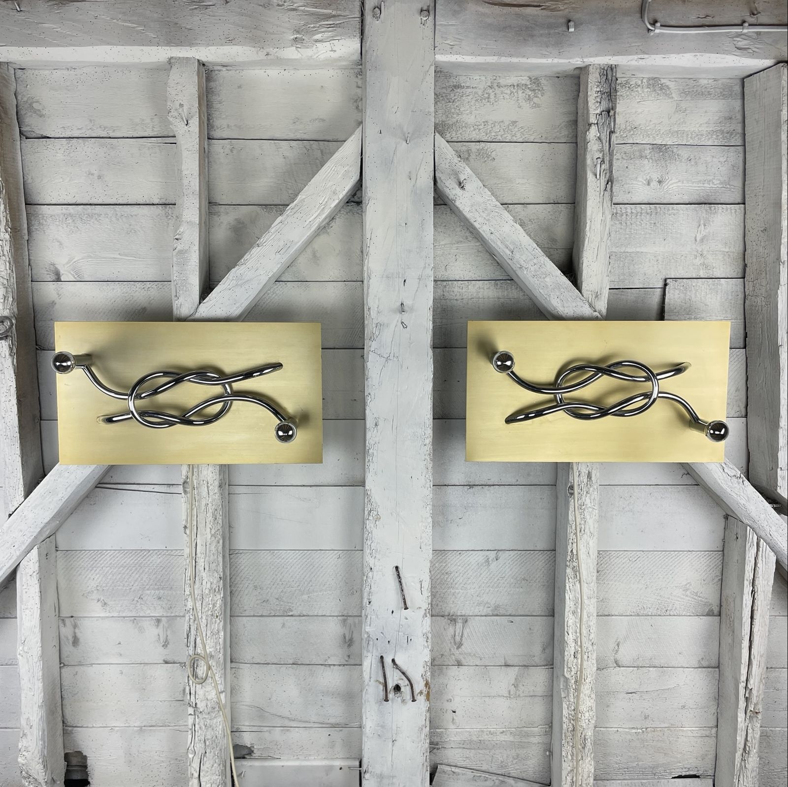 A Pair Of 1970s Italian 'Reef Knot' Wall Light Panels / Sconces Designed By Giacomo Benevelli For Missaglia