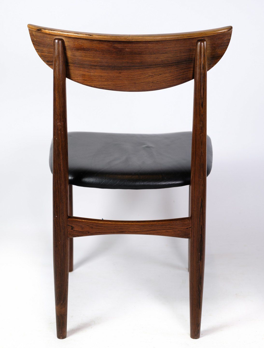 A Set Of Six Dining Table Chairs Of Danish Design In Rosewood With Black Leather From The 1960s. photo buy