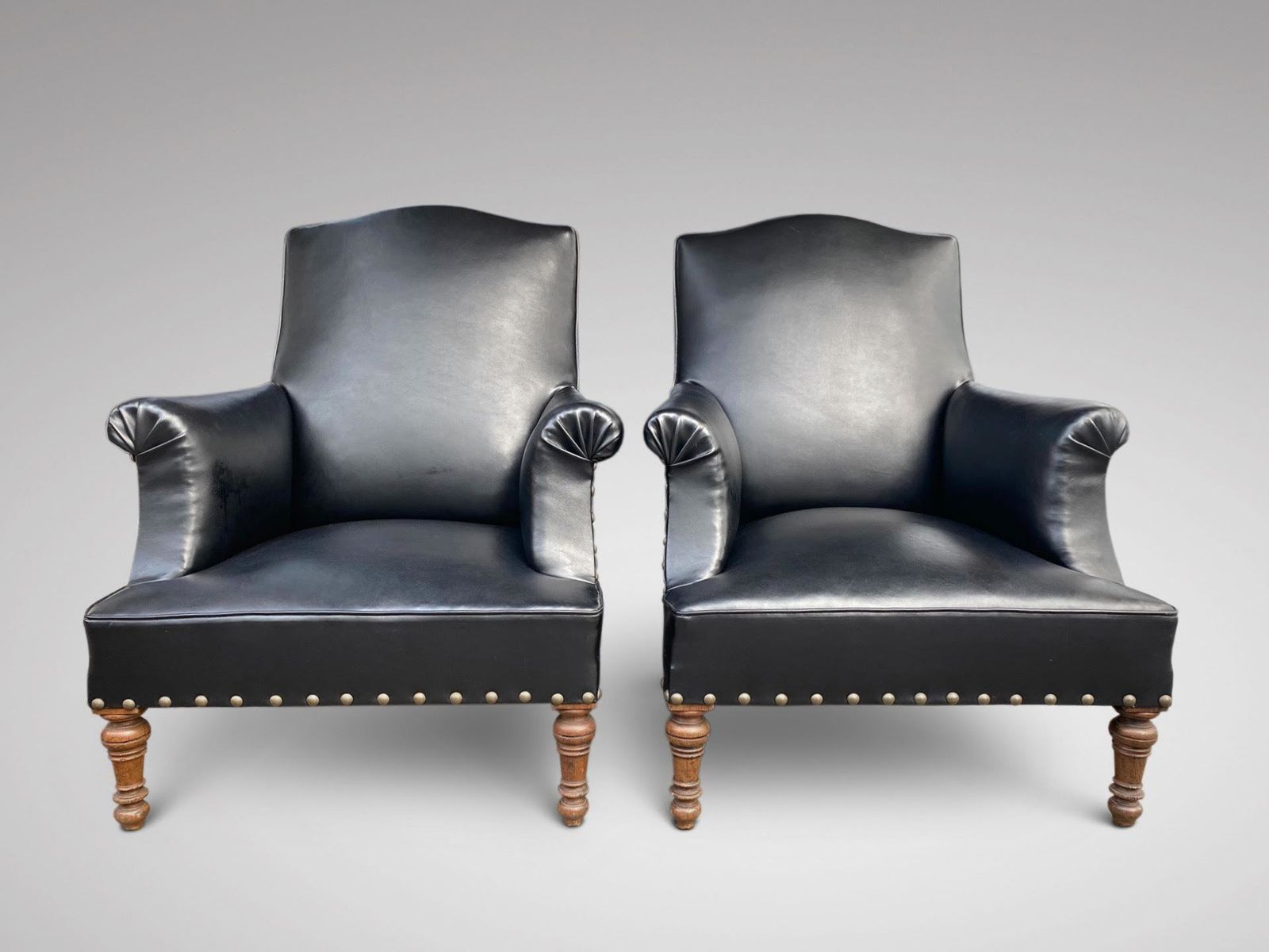 Pair Of French Black Leather Armchairs