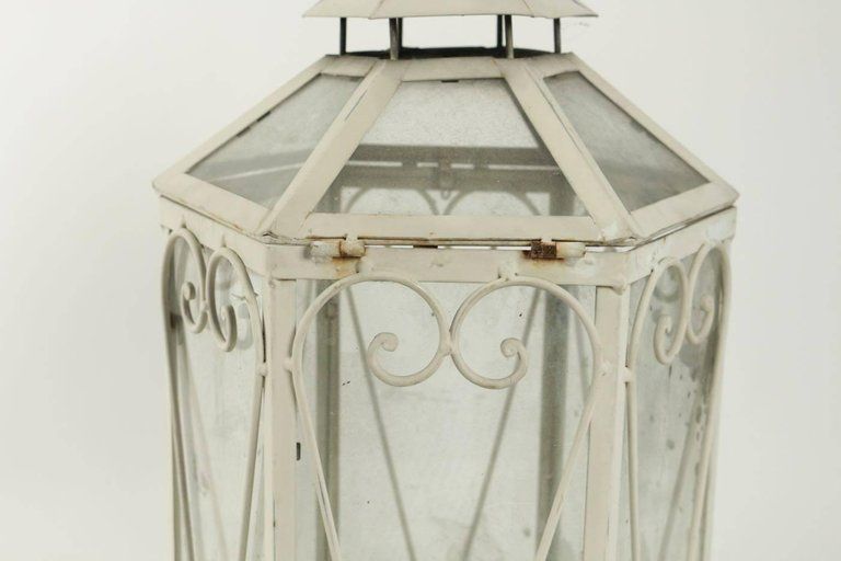 Wrought Iron Lantern In The Shape Of A Miniature Greenhouse photo furniture