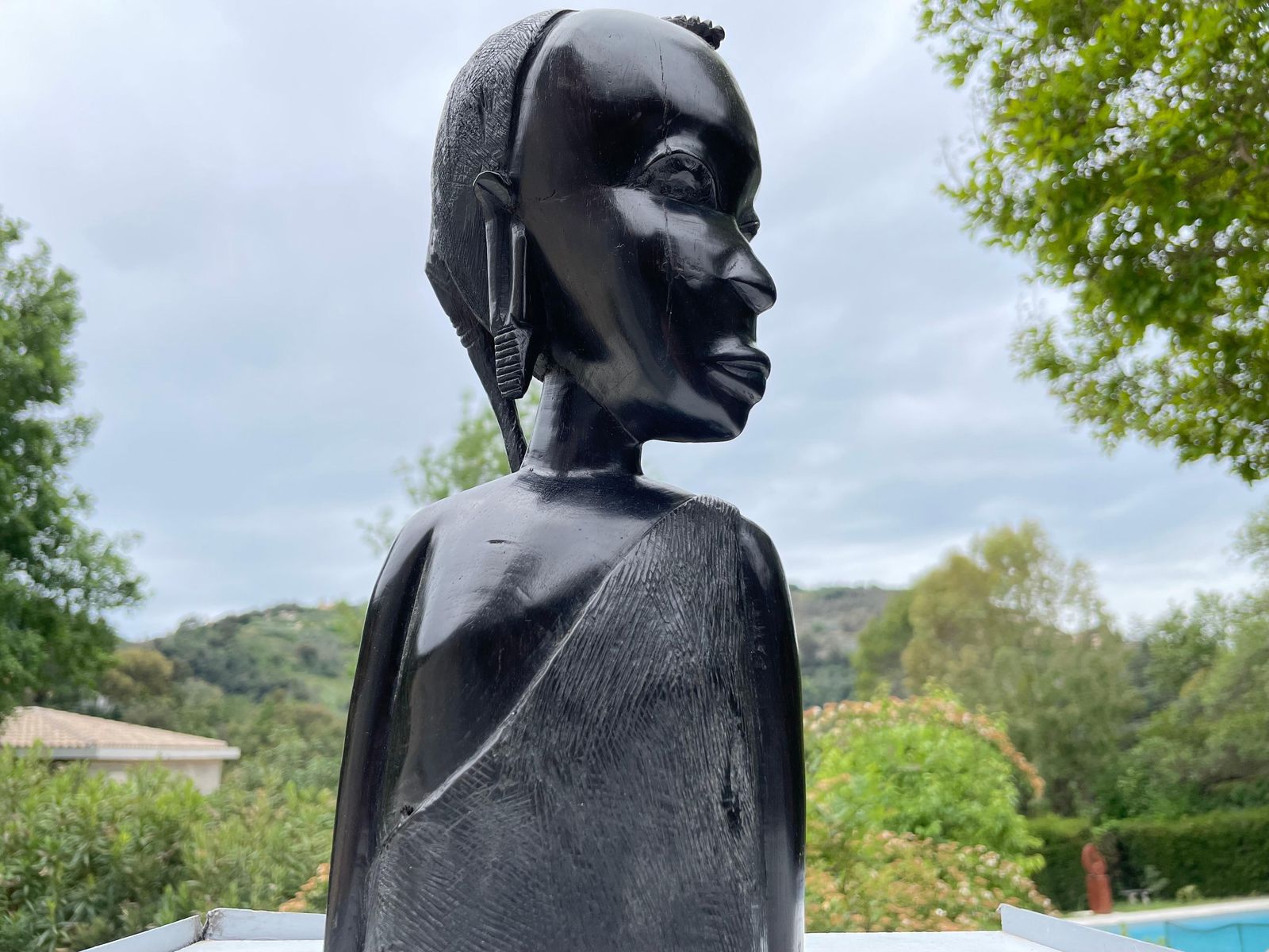 Sculpture In Wood From Africa, Bust Of A Woman, In A Black Color, Circa 1960 photo for sale