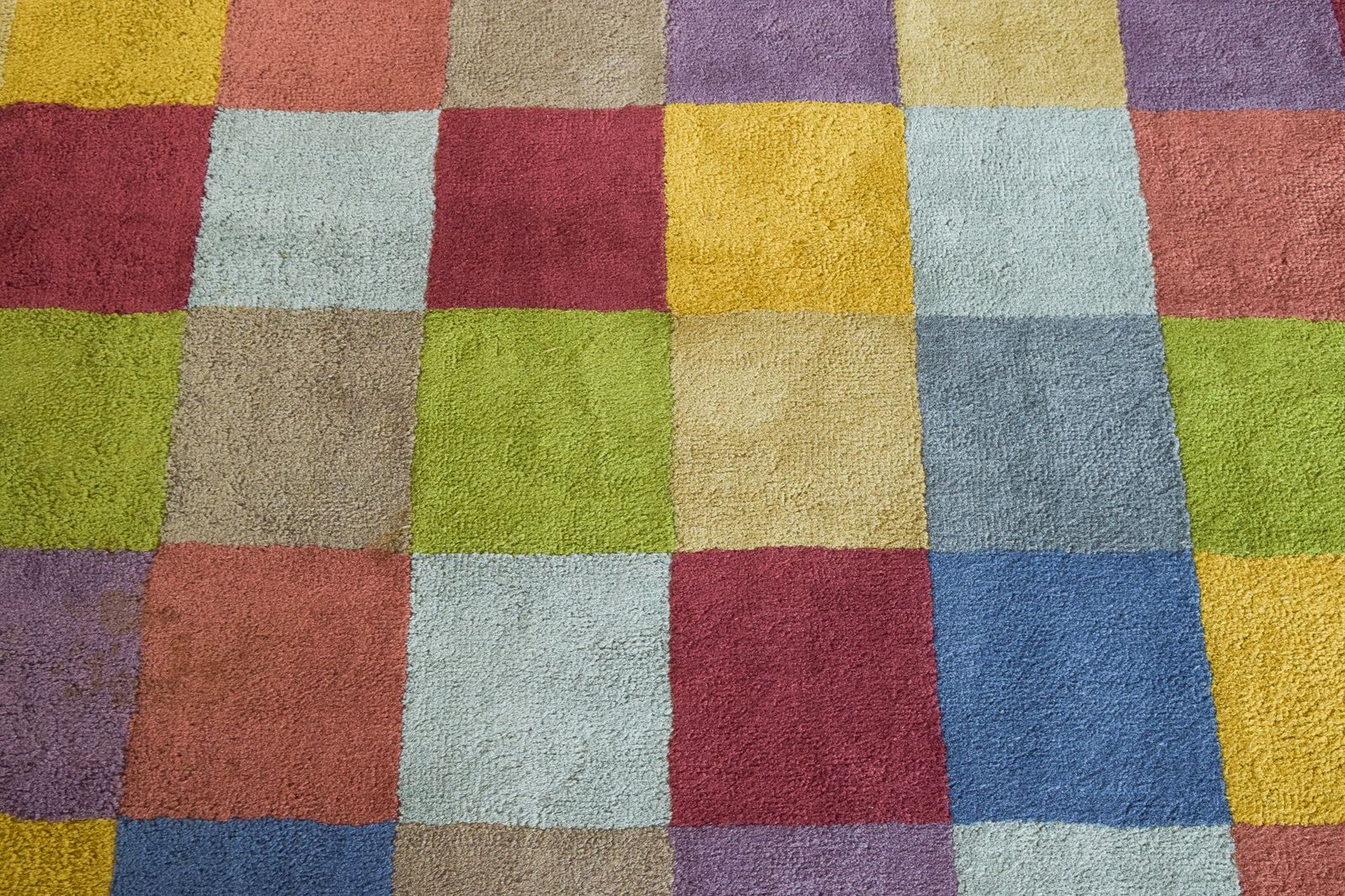 Kleurrijk Geblokt Handgeweven Vloerkleed photo Textiel