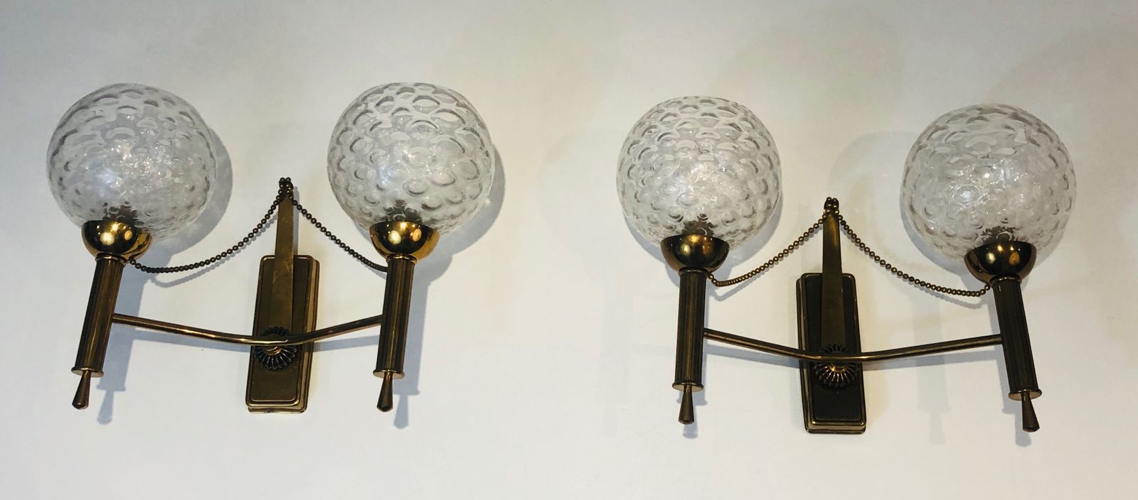 Pair Of Brass And Glass Ball Sconces. Around 1970