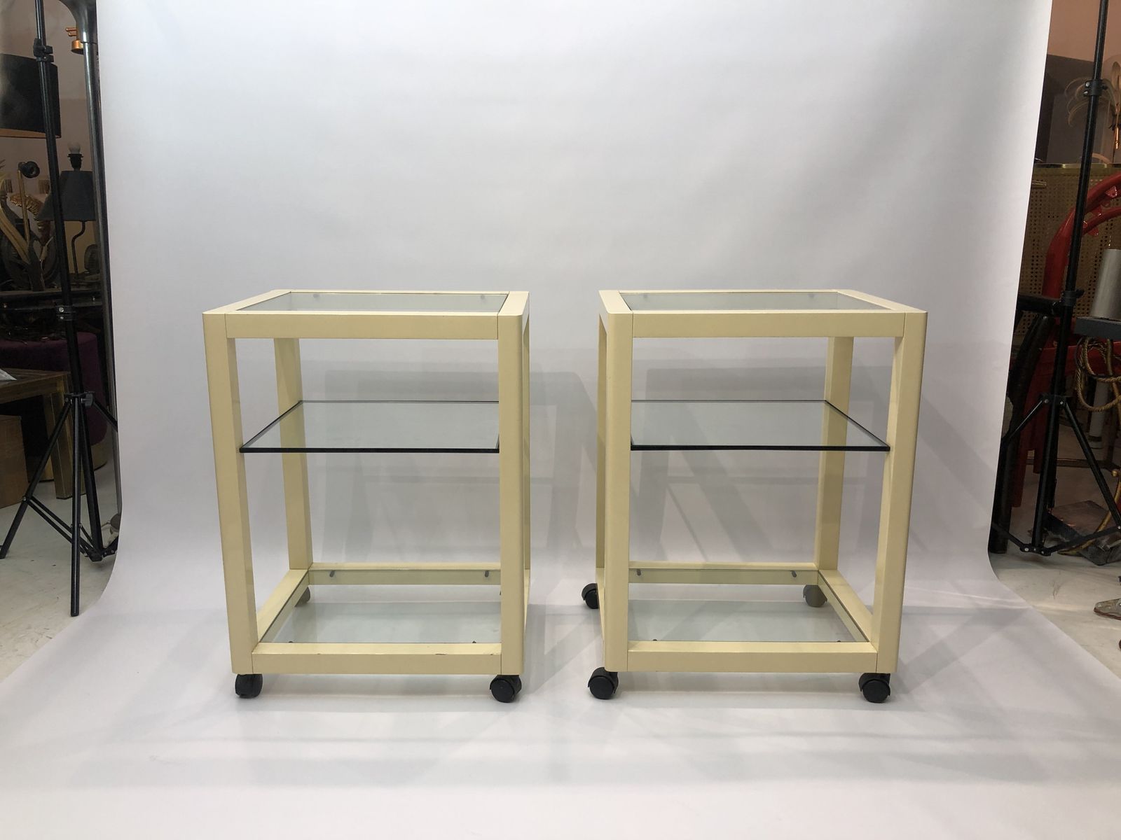 Pair Of Cream Lacquered Side Tables Wheels 1970s Hollywood Regency Modernism