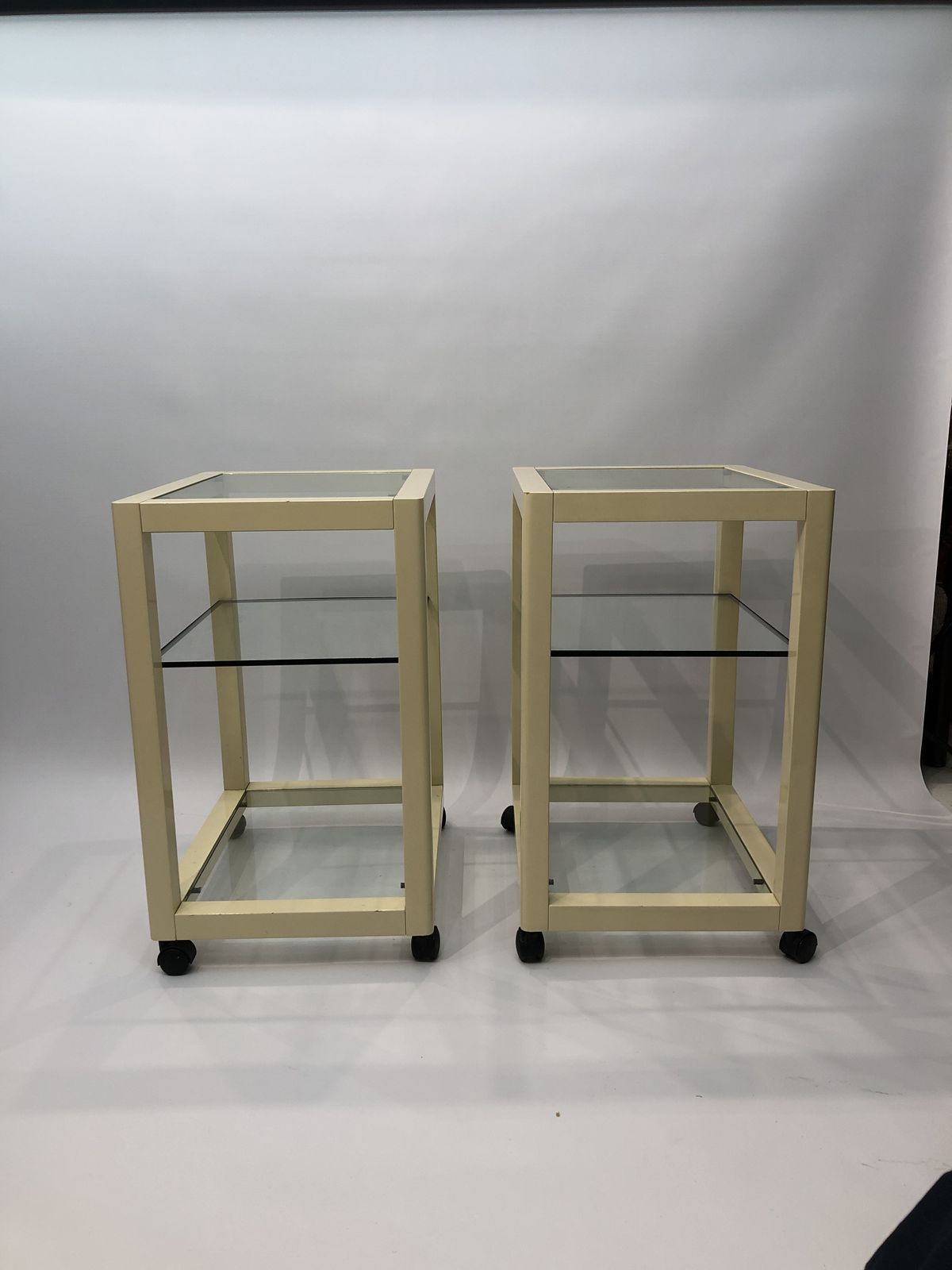 photo vinterior Pair Of Cream Lacquered Side Tables Wheels 1970s Hollywood Regency Modernism
