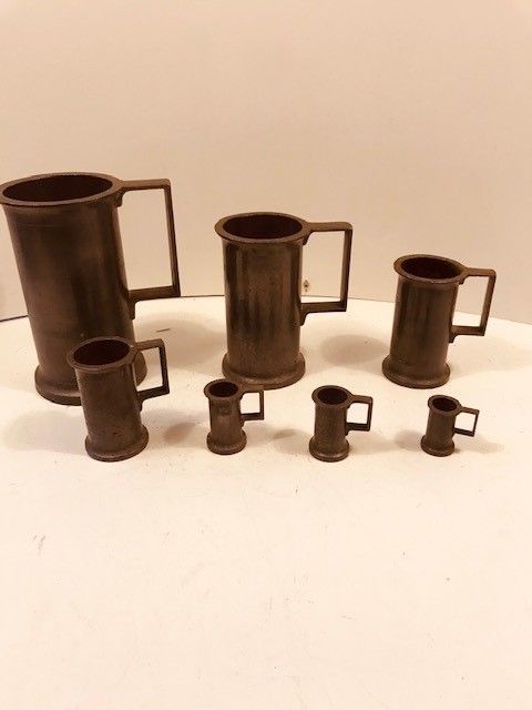 A Set Of 7 French Graduated Pewter Measures 1 Litre To 1 Centilitre