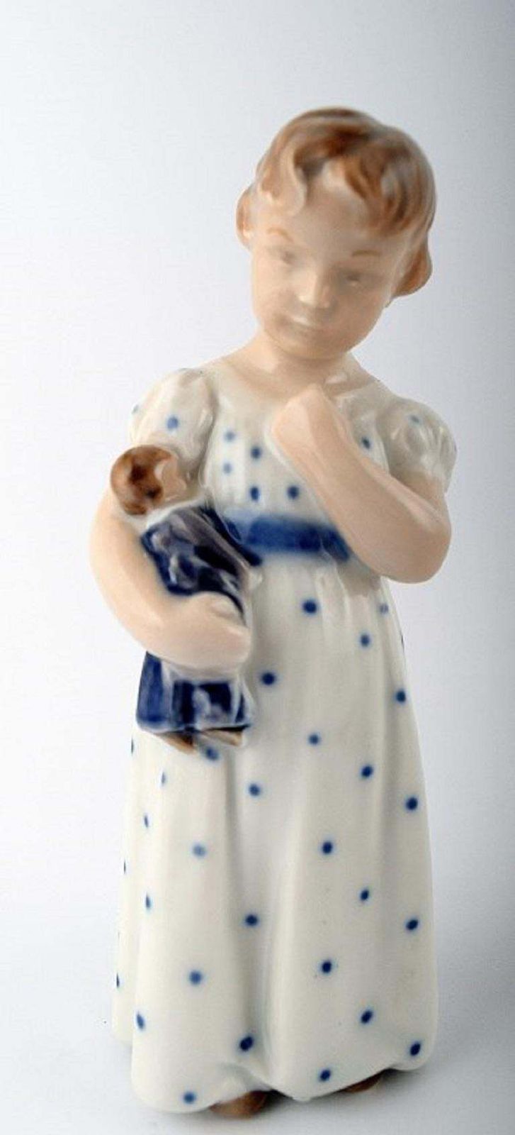 Royal Copenhagen Figurine No. 3539 Girl With A Doll photo for sale