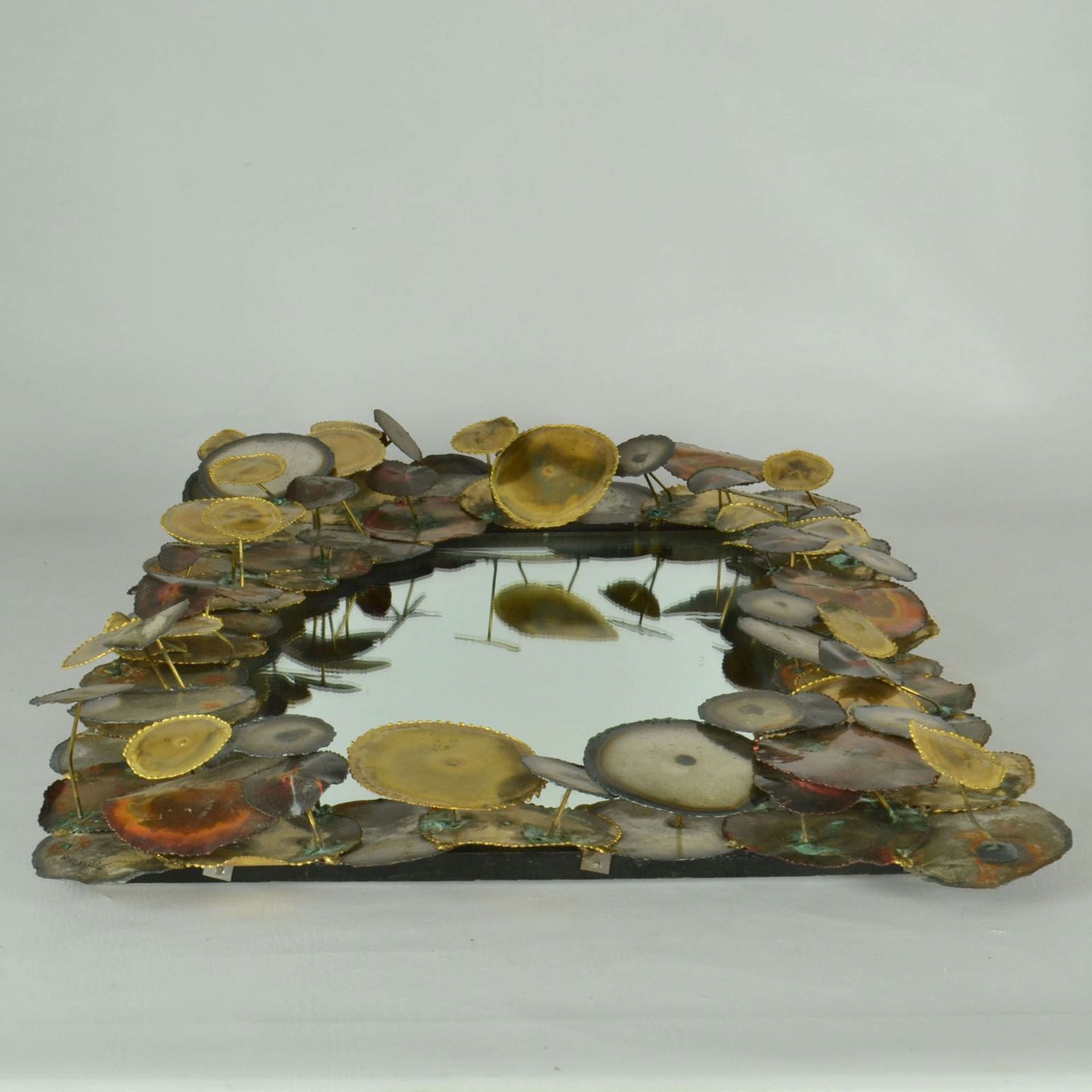 Brutalist Wall Mirror Edged With Metal Circles In The Style Of Curtis photo buy