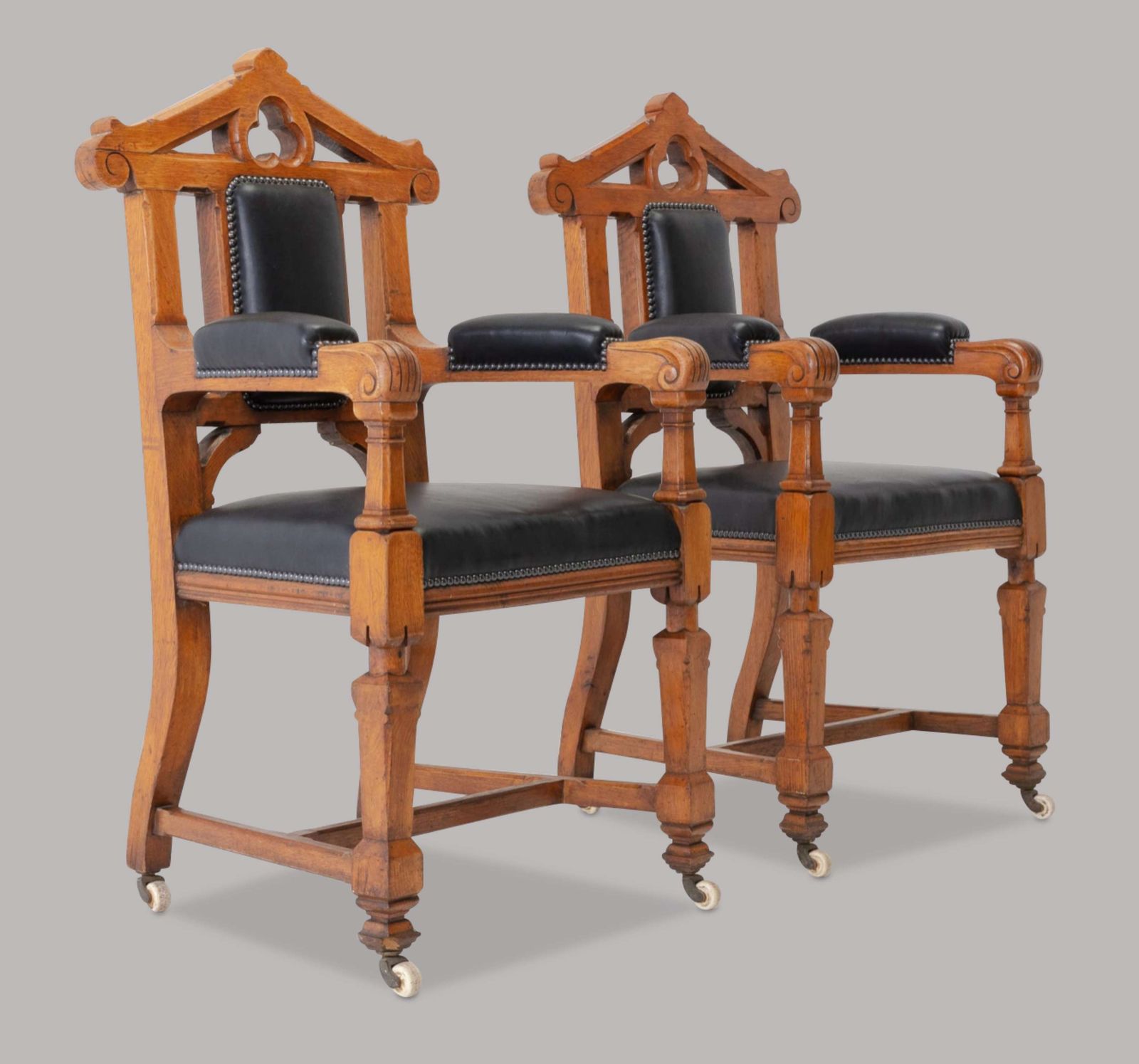 An Unusual C19th Pair Of Golden Oak And Leather Open Armchairs
