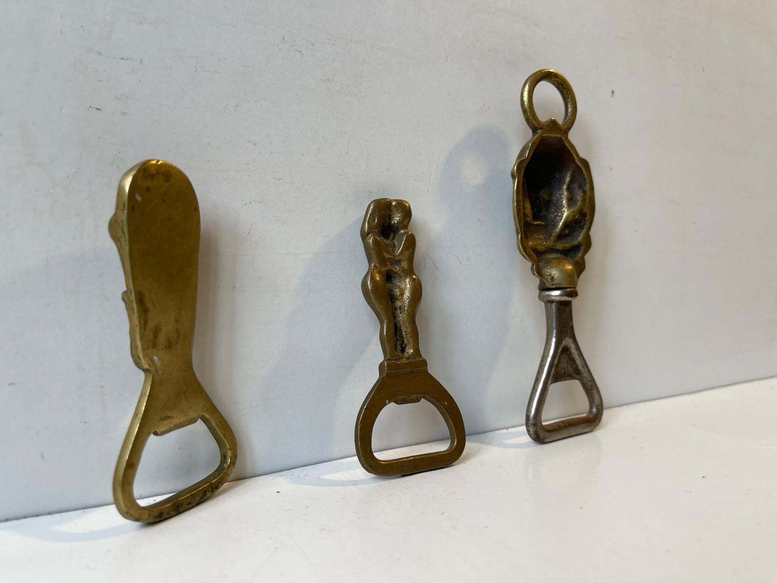 Antique Bottle Cap Openers In Brass, Set Of 3 photo for sale