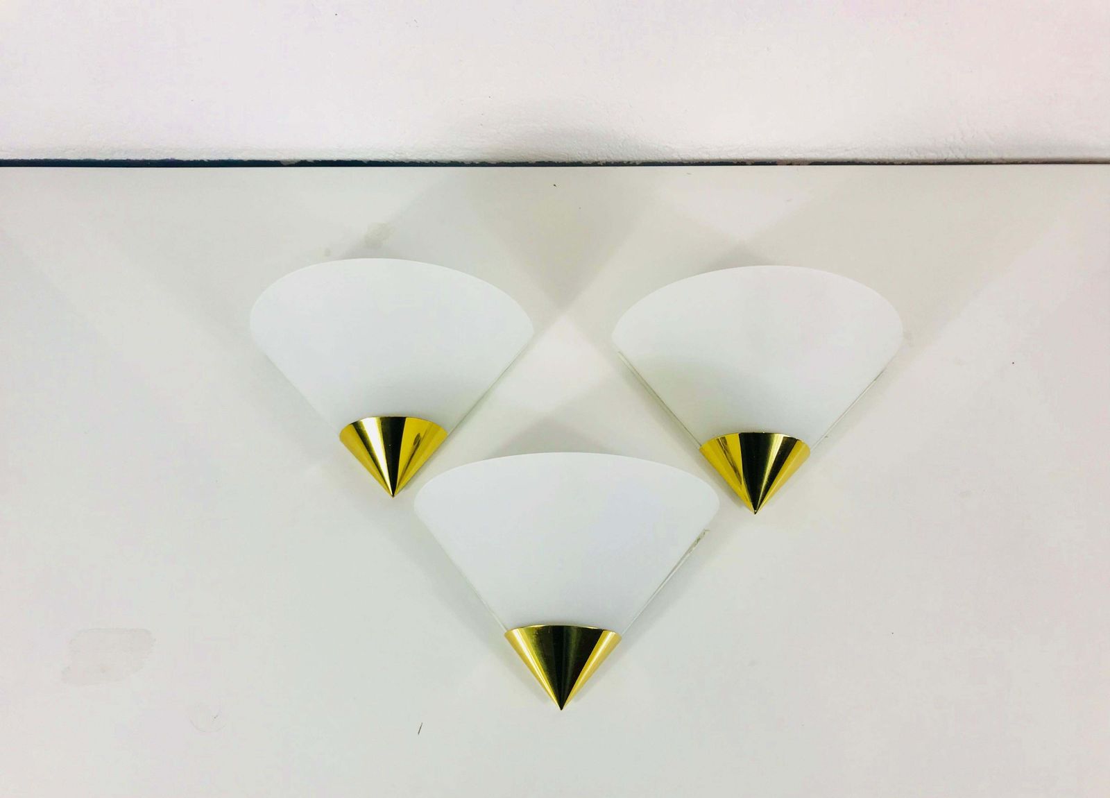 Set Of 3 Midcentury Brass And Opaline Glass Wall Lamps By Limburg, 1970s photo furniture