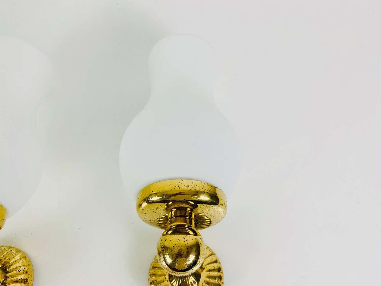 photo furniture Pair Of Midcentury Brass And Opaline Glass Wall Lamps, Italy, 1960s