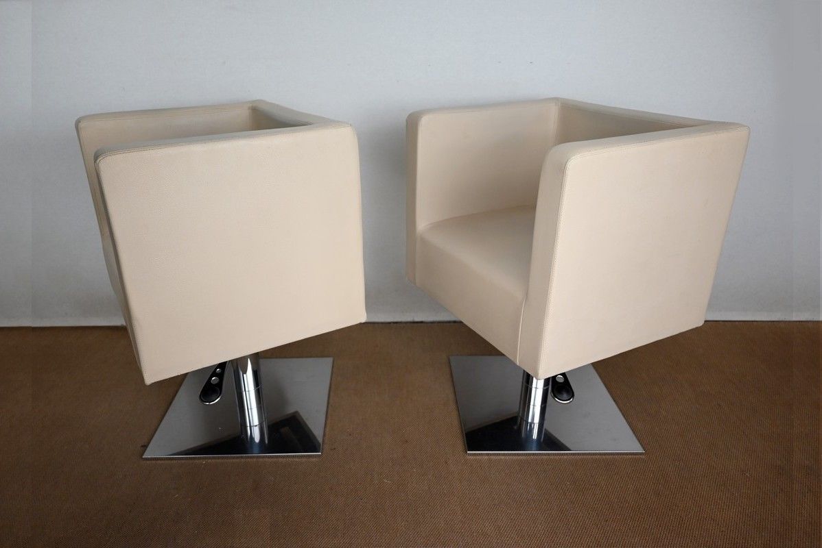photo furniture Pair Of "Palladium" Swivel Armchairs In Faux Leather   Xxth