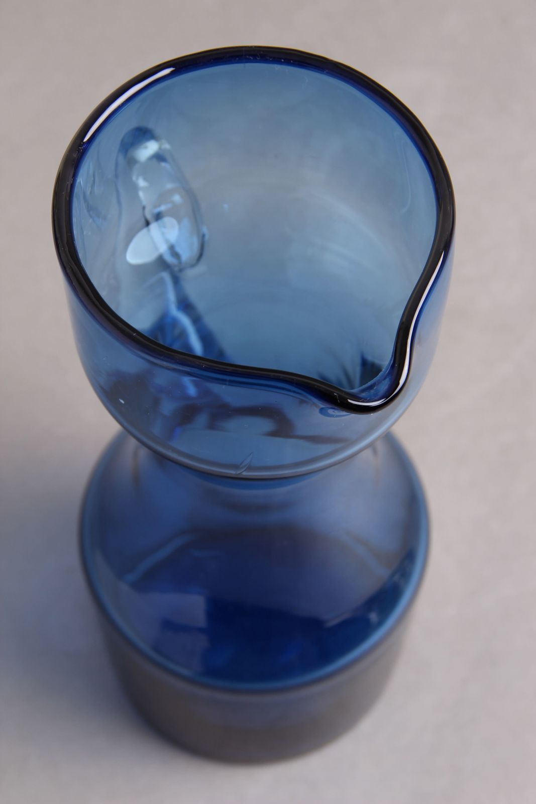 Glass Jug In Blue Glass With Attached Handle In Transparent Glass, Typical 1950s 1960s Design In High Quality. photo for sale
