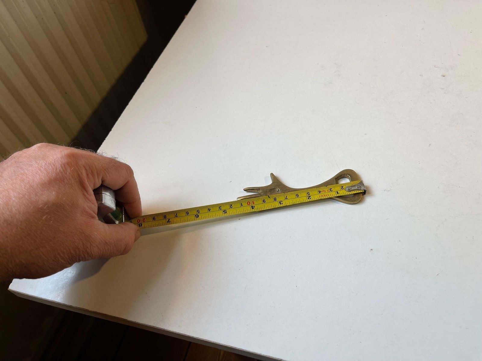 Scandinavian Brass Bottle Cap Opener In The Style Of Carl Auböck, 1950s photo for sale