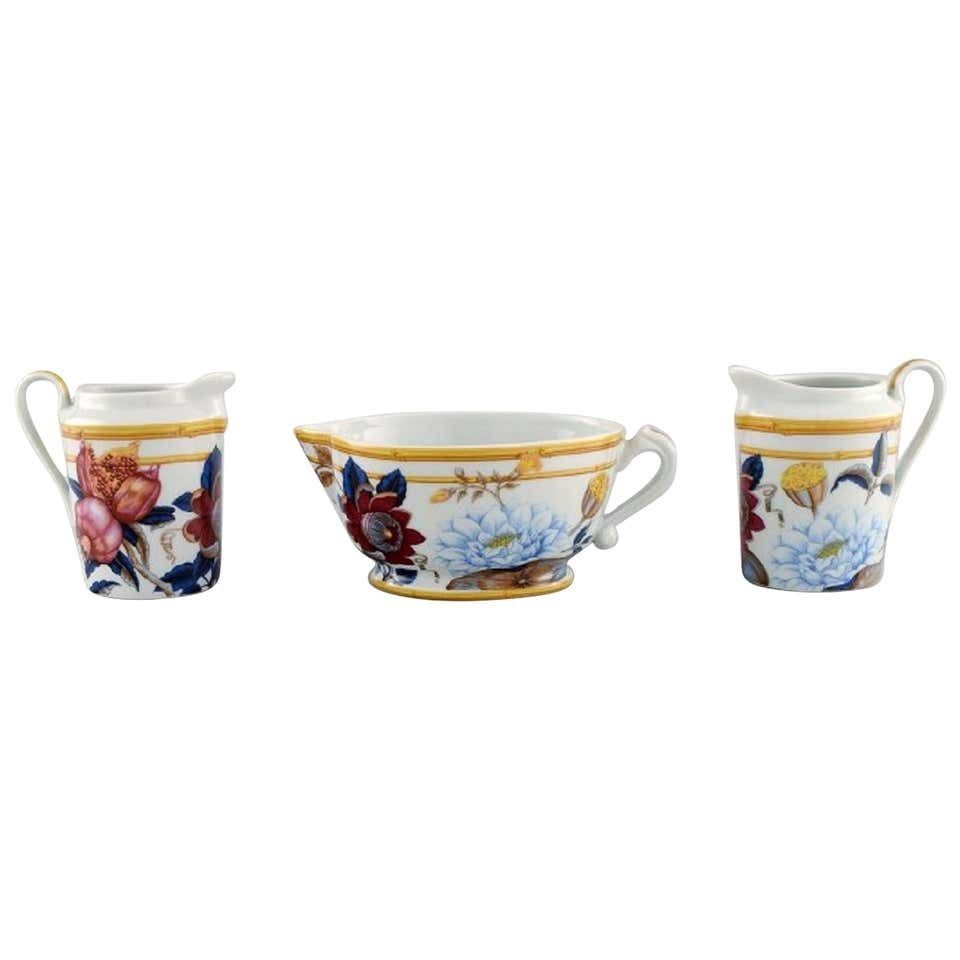 Porcelain Of Paris. "Tropical Aurore". Three Porcelain Jugs With Flowers