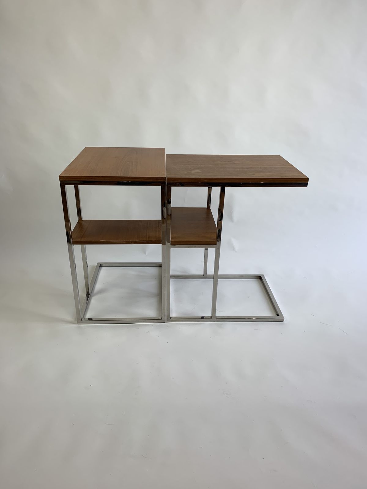 A Pair Of Mid Century Chrome And Wood Side Tables