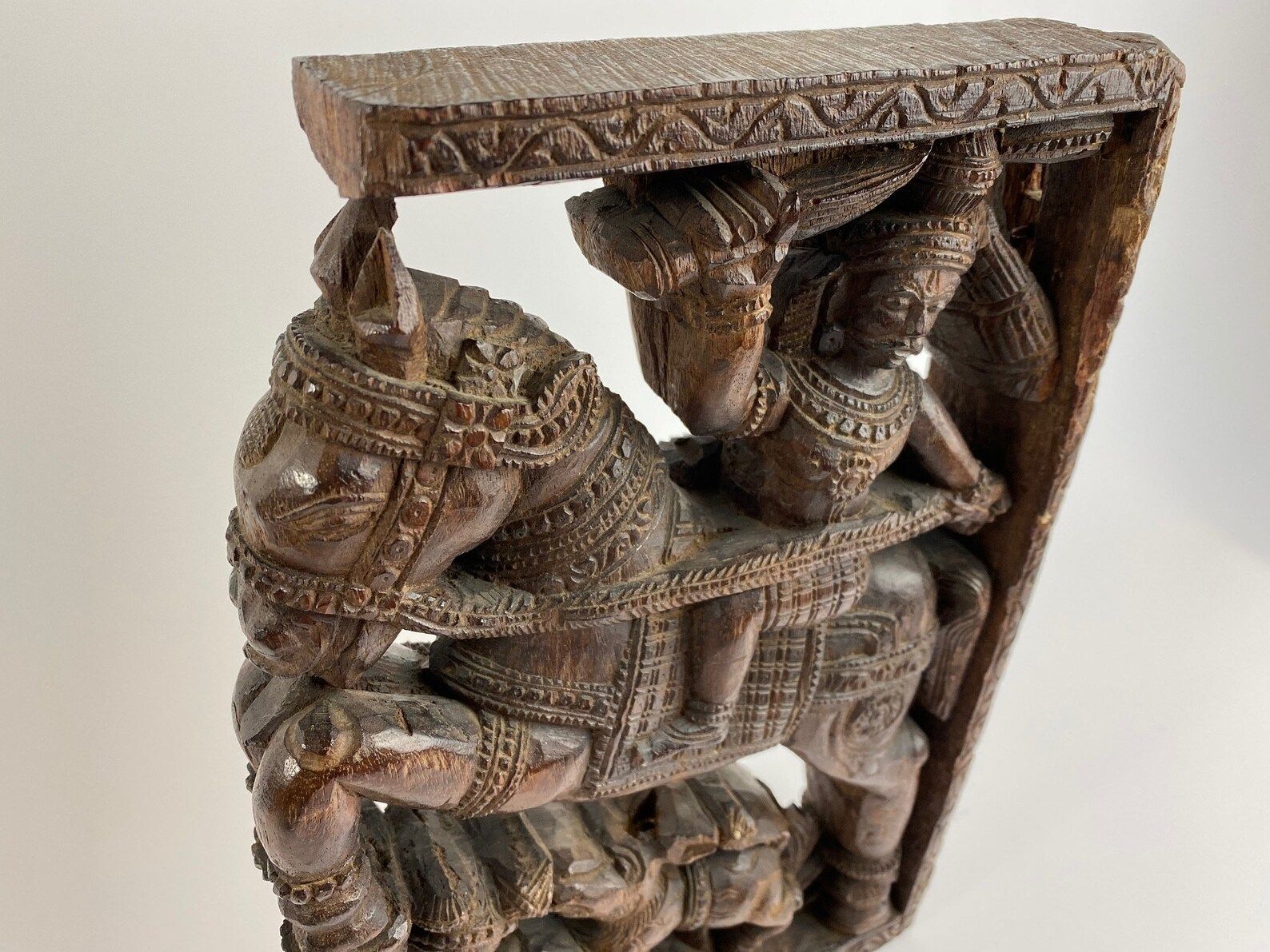 Handmade Carving Panel Of Wood From Indian Temple Car To Celebrate Hindu Gods Man On Horse And Man With Dog photo 322.0