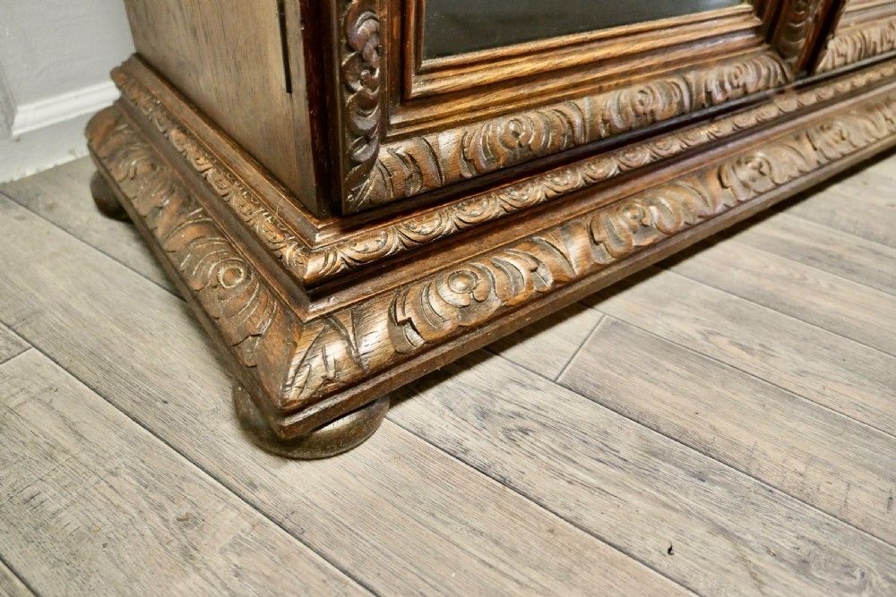 Fine Quality 19th Century Carved Oak Glazed Bookcase. photo Furniture