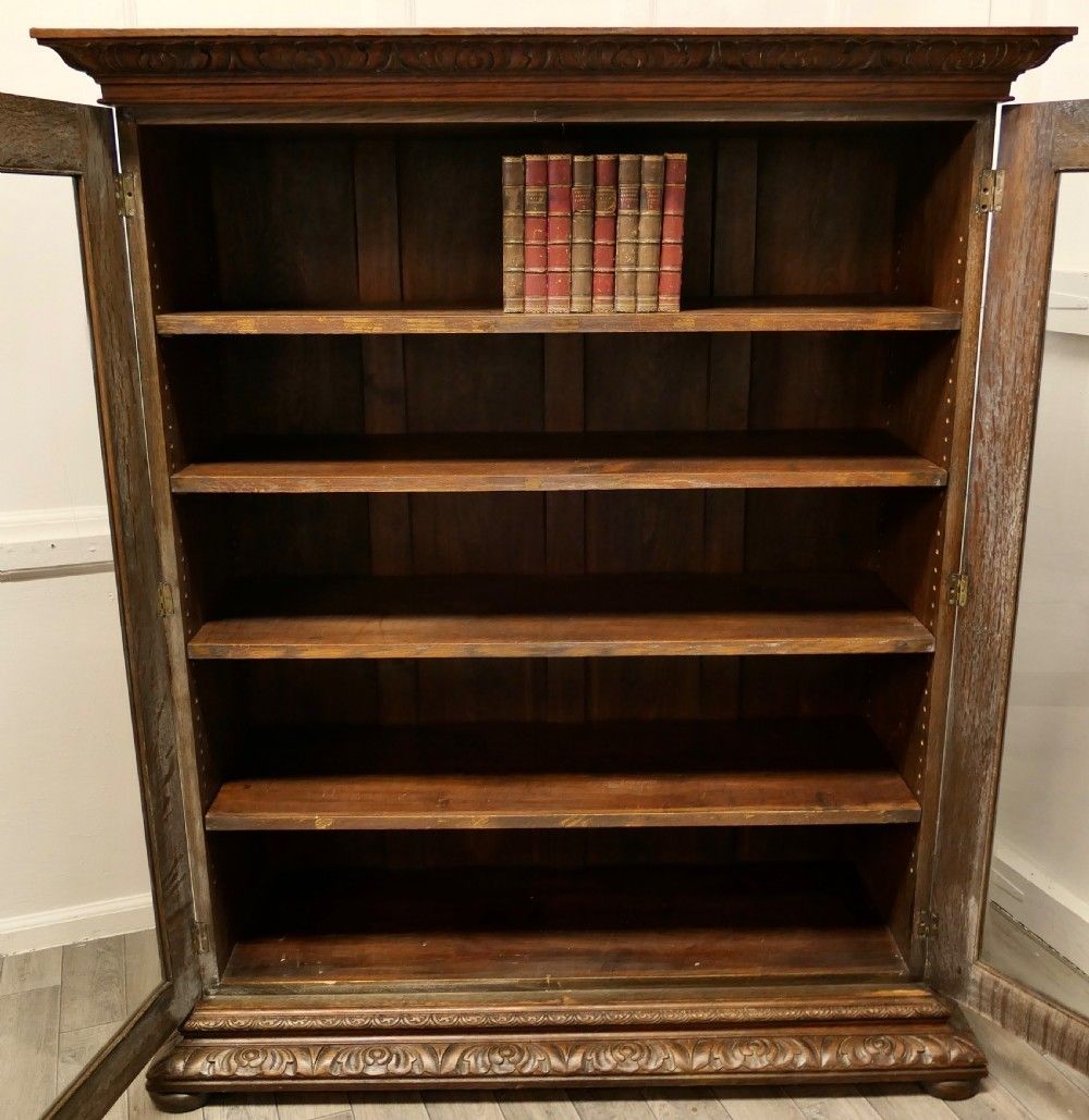 Fine Quality 19th Century Carved Oak Glazed Bookcase. photo vintage