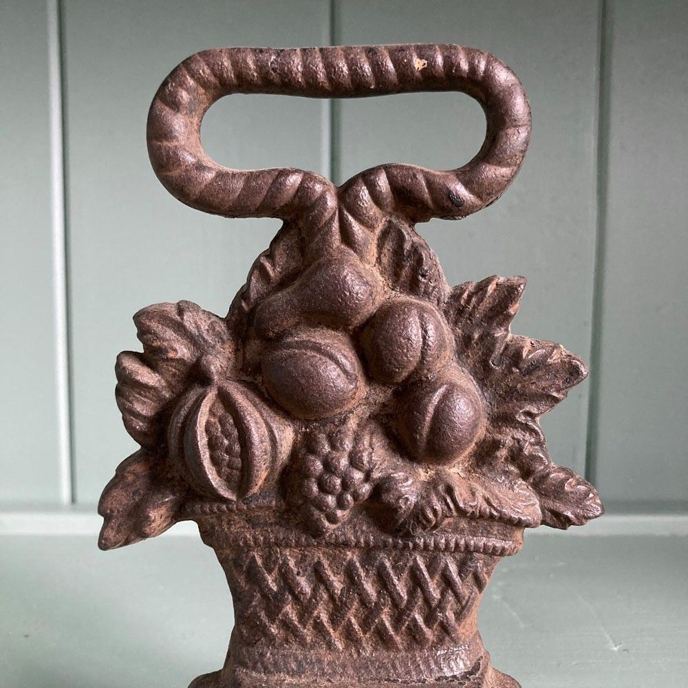 Victorian Cast Iron Door Stop   'Fruit Basket' photo for sale