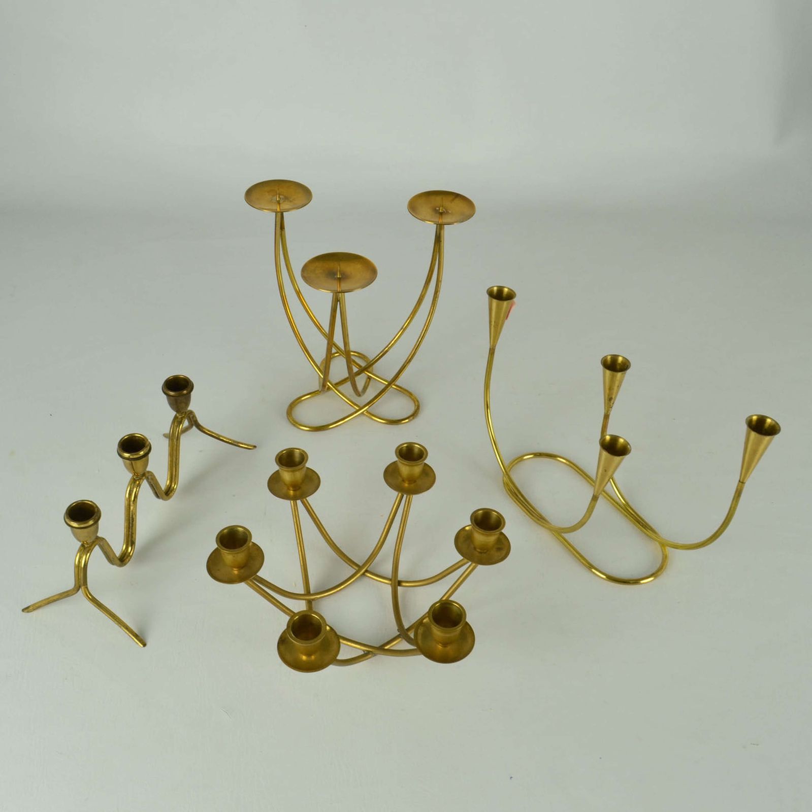 View Larger Image Of Group Of Four Brass Candelabras With Organic Curv photo furniture