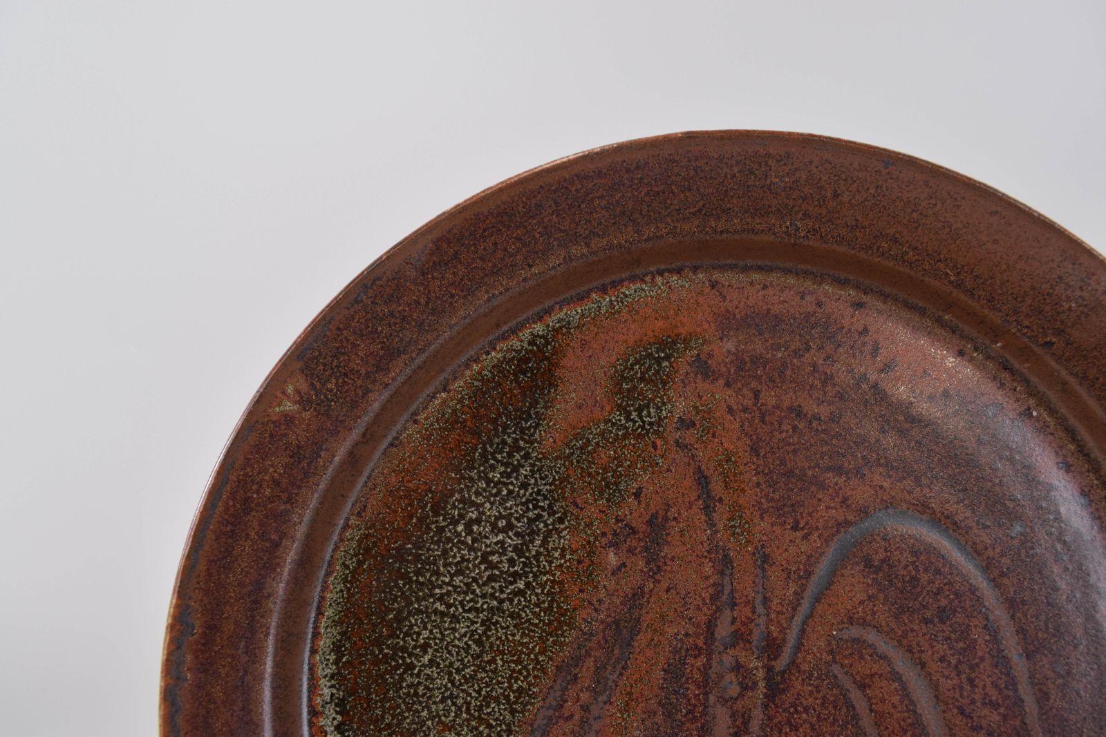 Studio Pottery; Iron Glaze Charger With Finger Wipe Decoration. photo furniture