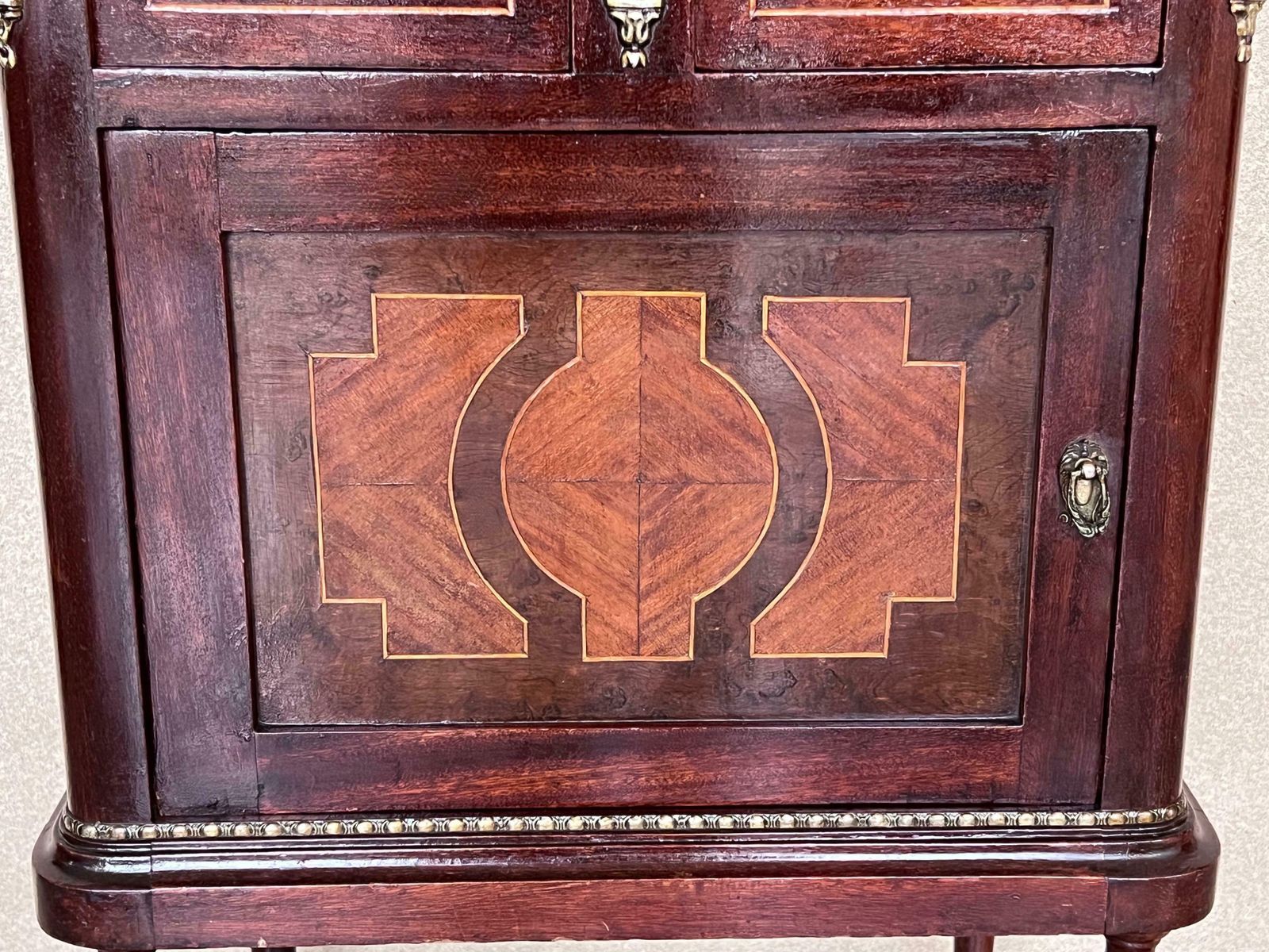 photo furniture Pair Of Italian Marquetry Nightstands With Bronze Crest, Drawers And Doors