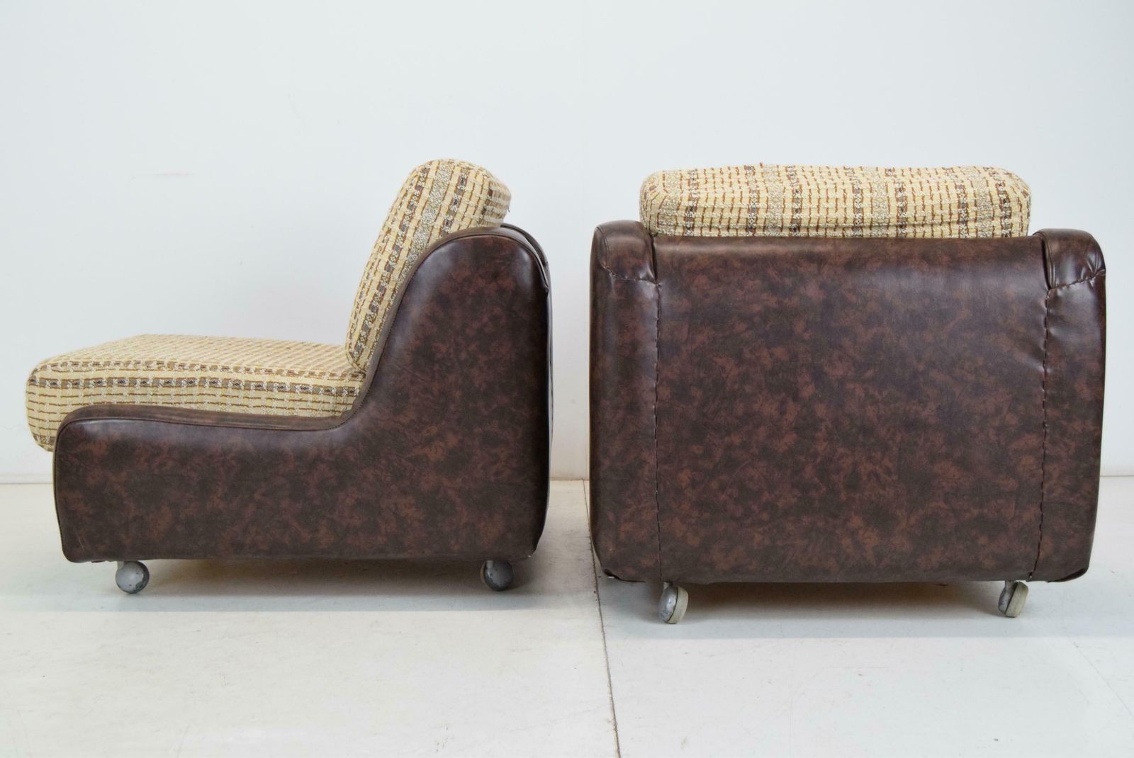 photo furniture Pair Of Mid Century Leatherette Armchairs On The Wheels,1970's.