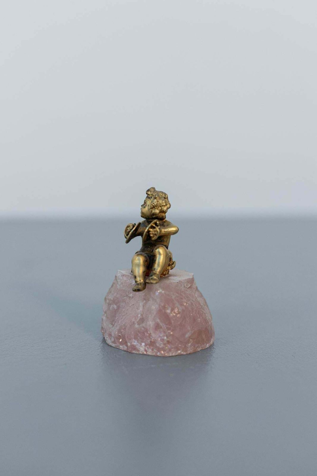Baroque Statue Of Silver Cherub On Rose Quartz photo Home Decor