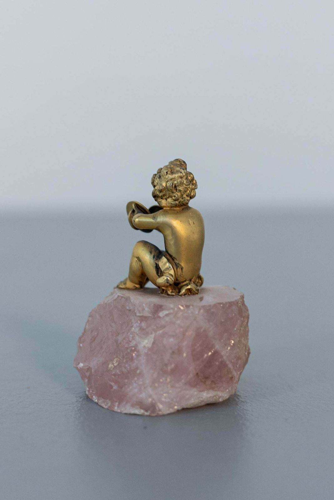 Baroque Statue Of Silver Cherub On Rose Quartz photo 1302.0