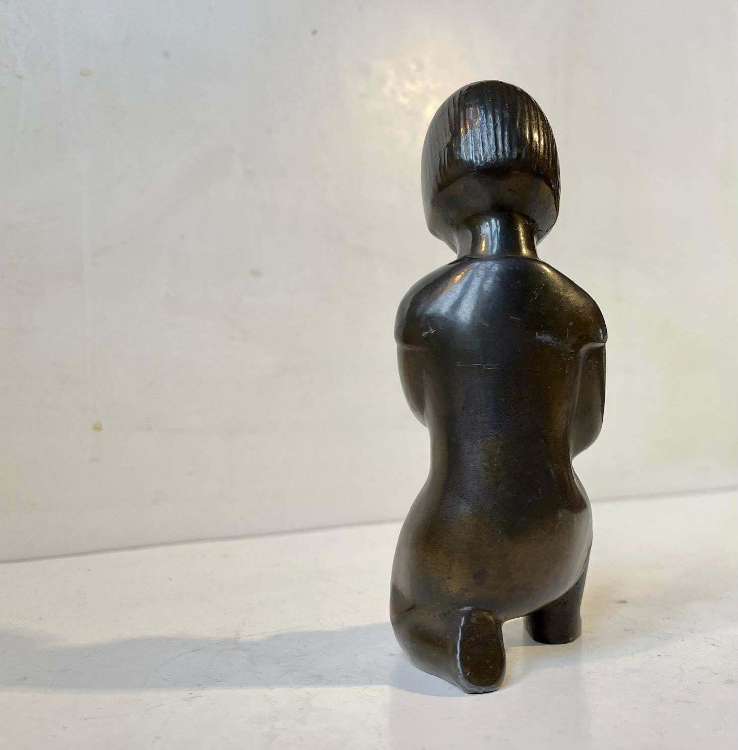 Scandinavian Bronze Figurine Of Inuit Girl With Flowers 1930s photo for sale