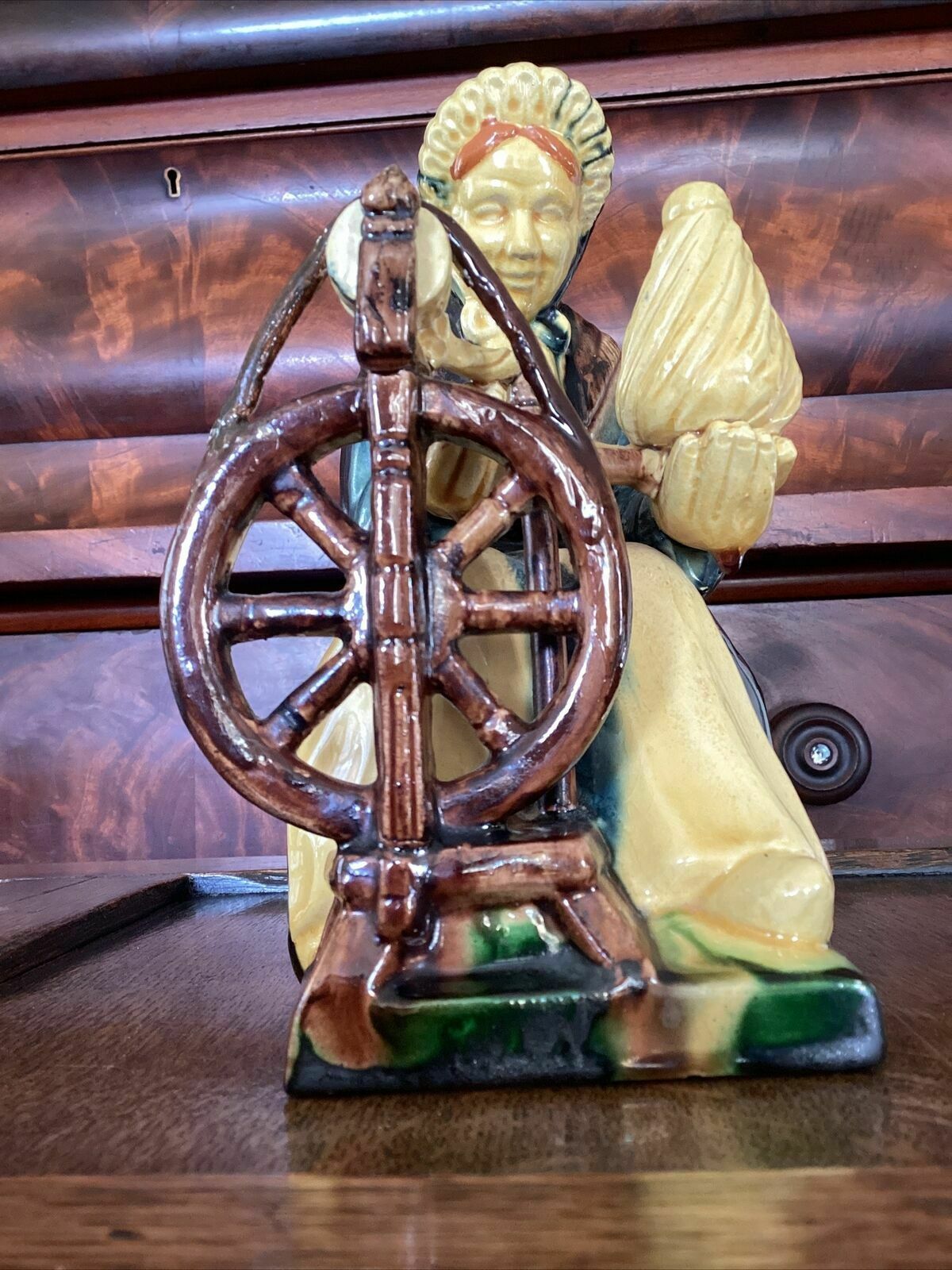 photo buy Early 20th C Continental Bisque Pottery Figurine. Dutch Woman Spinning Yarn