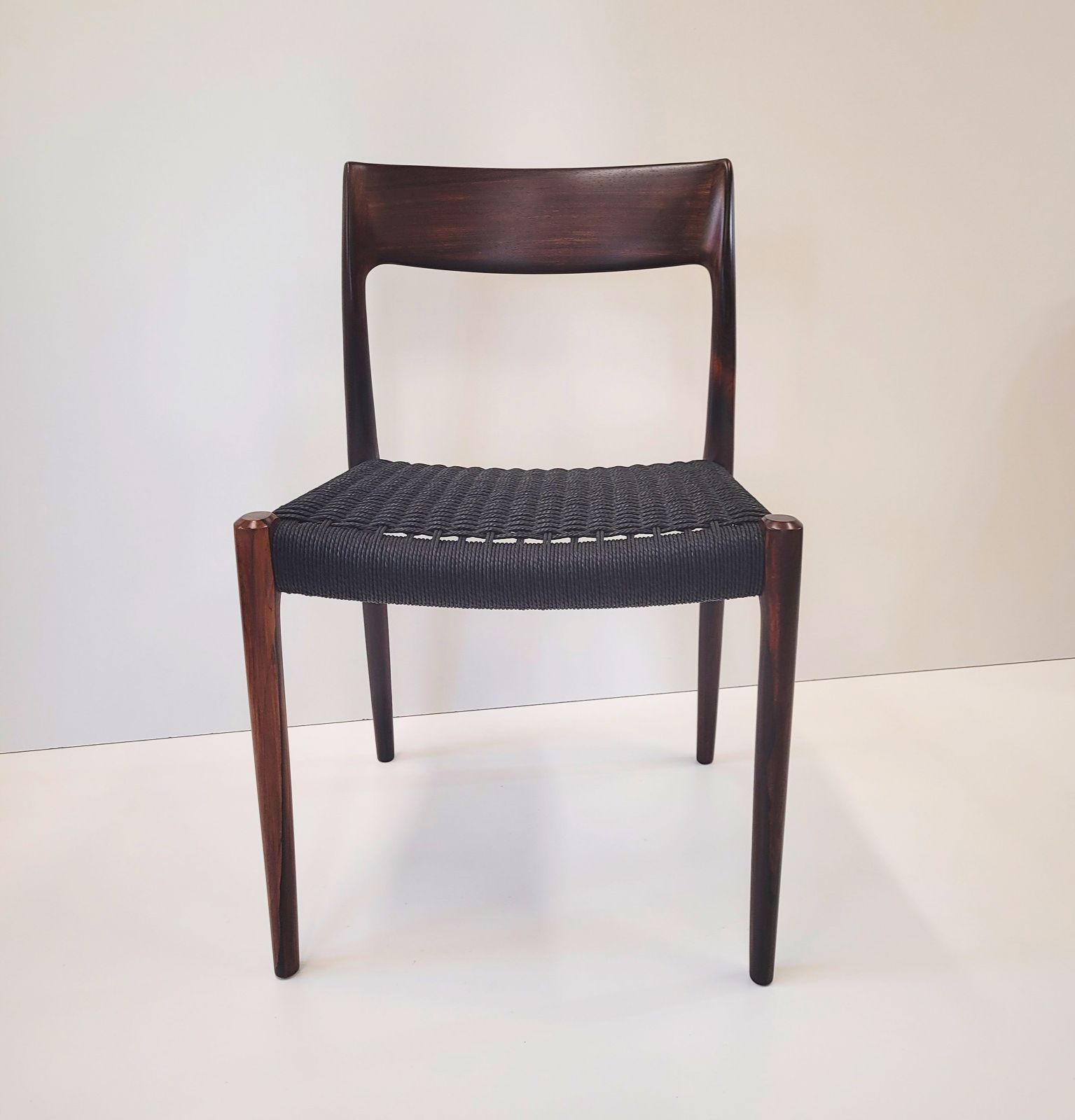 Niels Otto Møller #77 Rosewood Dining Chair Black Paper Cord Seat