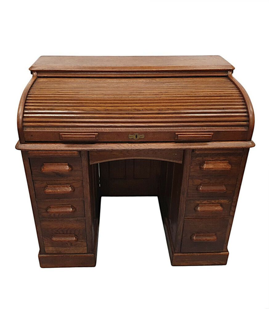 A Superb 1920s Oak Roll Top Desk