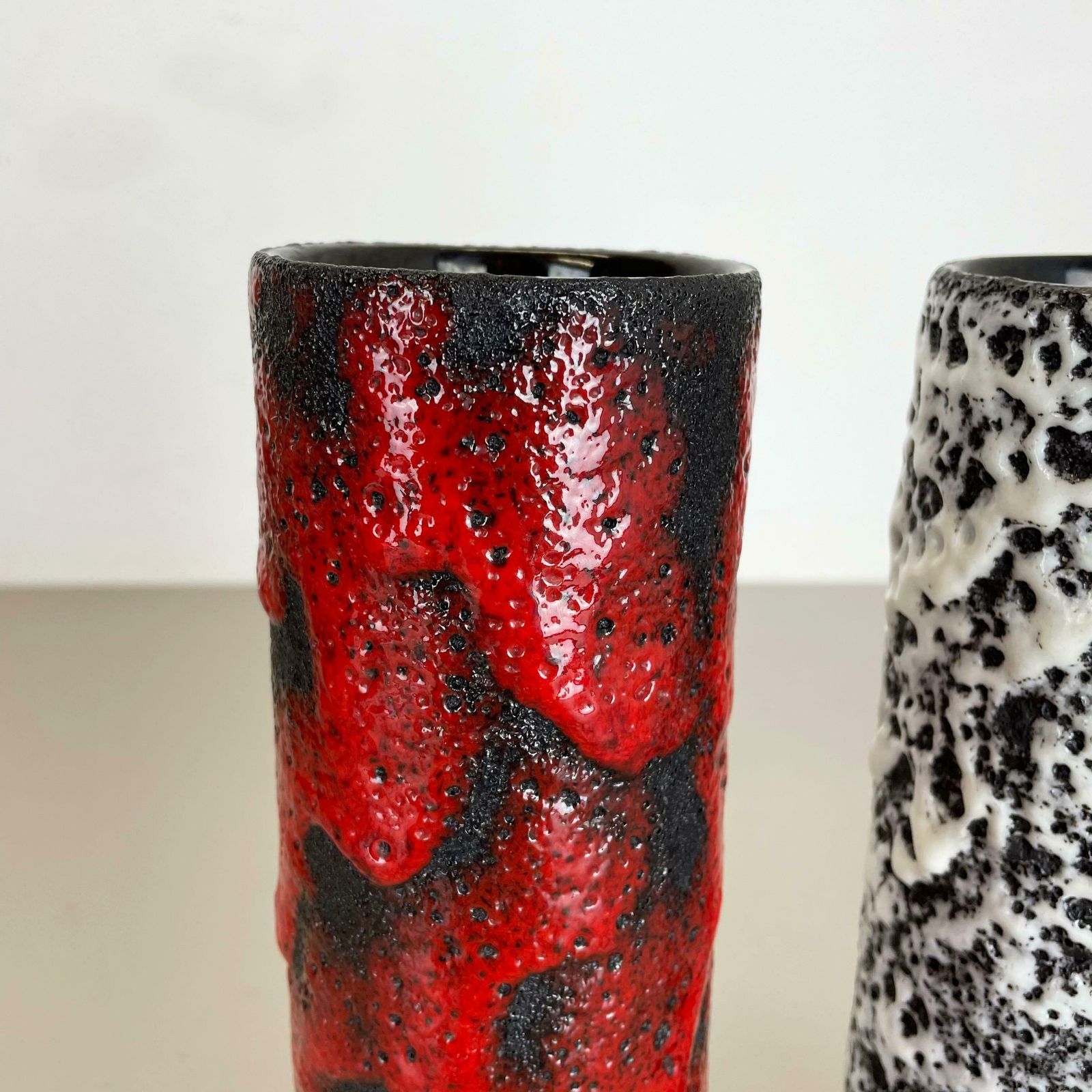 photo furniture Set Of Two Pottery Fat Lava Vases Black Red White By Jopeko  Germany 1970s
